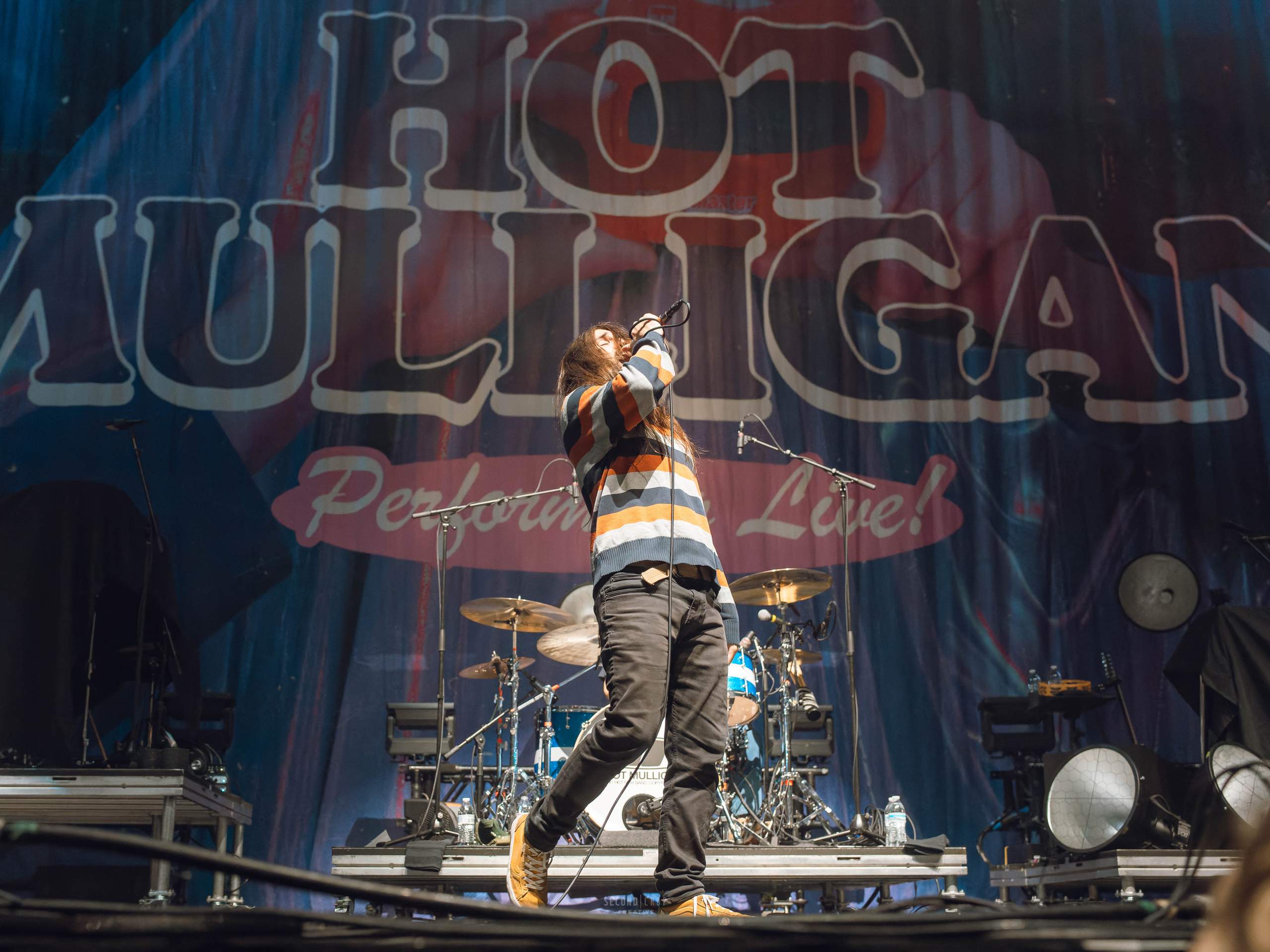 Hot Mulligan performing at Fiserv Forum on April 2, 2024 as part of Fall Out Boy's SO MUCH FOR (2OUR) DUST tour, photography by Ross Harried for Second Crop Music
