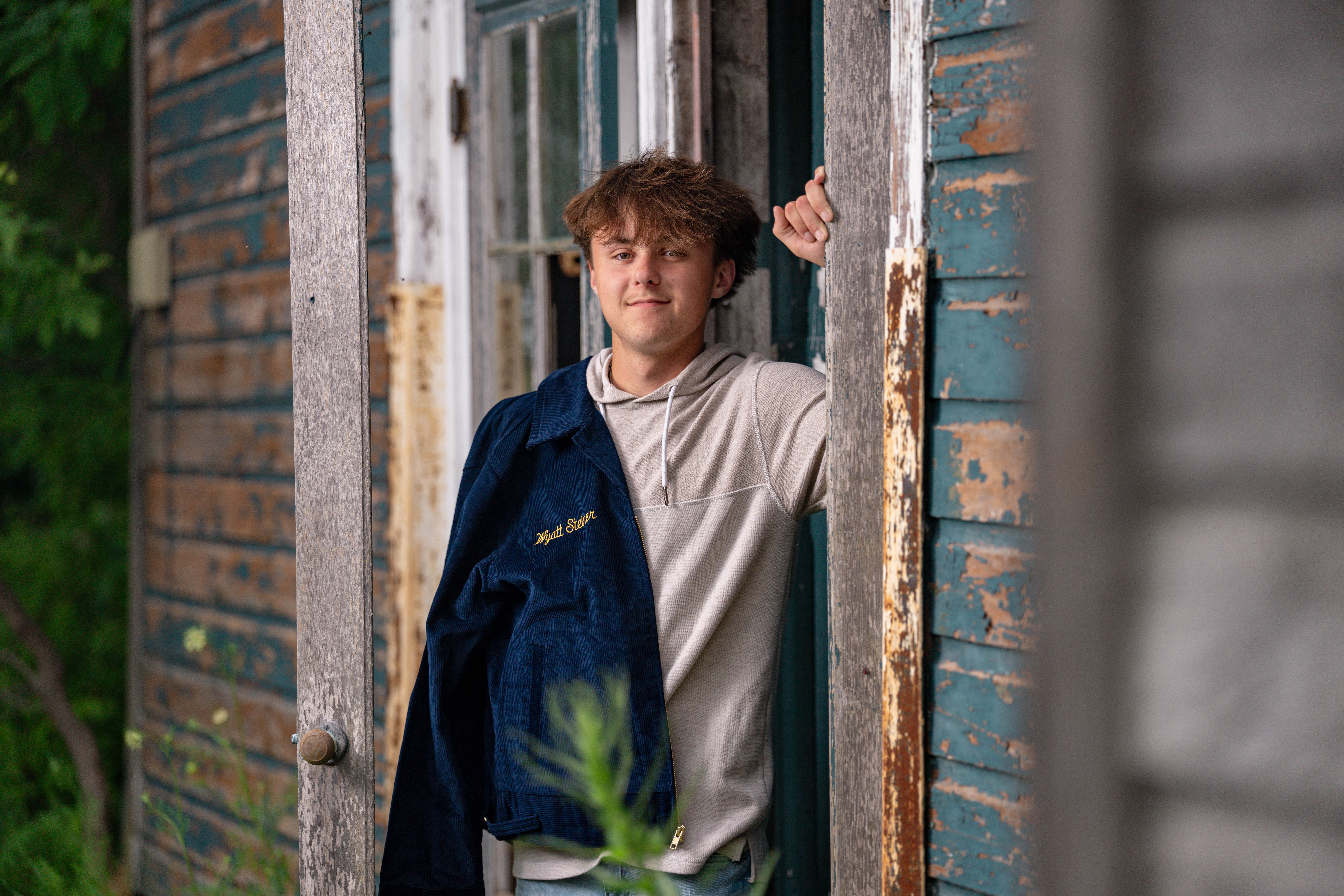 Click to View Larger Wyatt Steiner poses for a senior portrait session in Monroe, Wisconsin, on June 30, 2025. Steiner will be a Class of 2026 graduate. Photography by Ross Harried for Second Crop Creative.