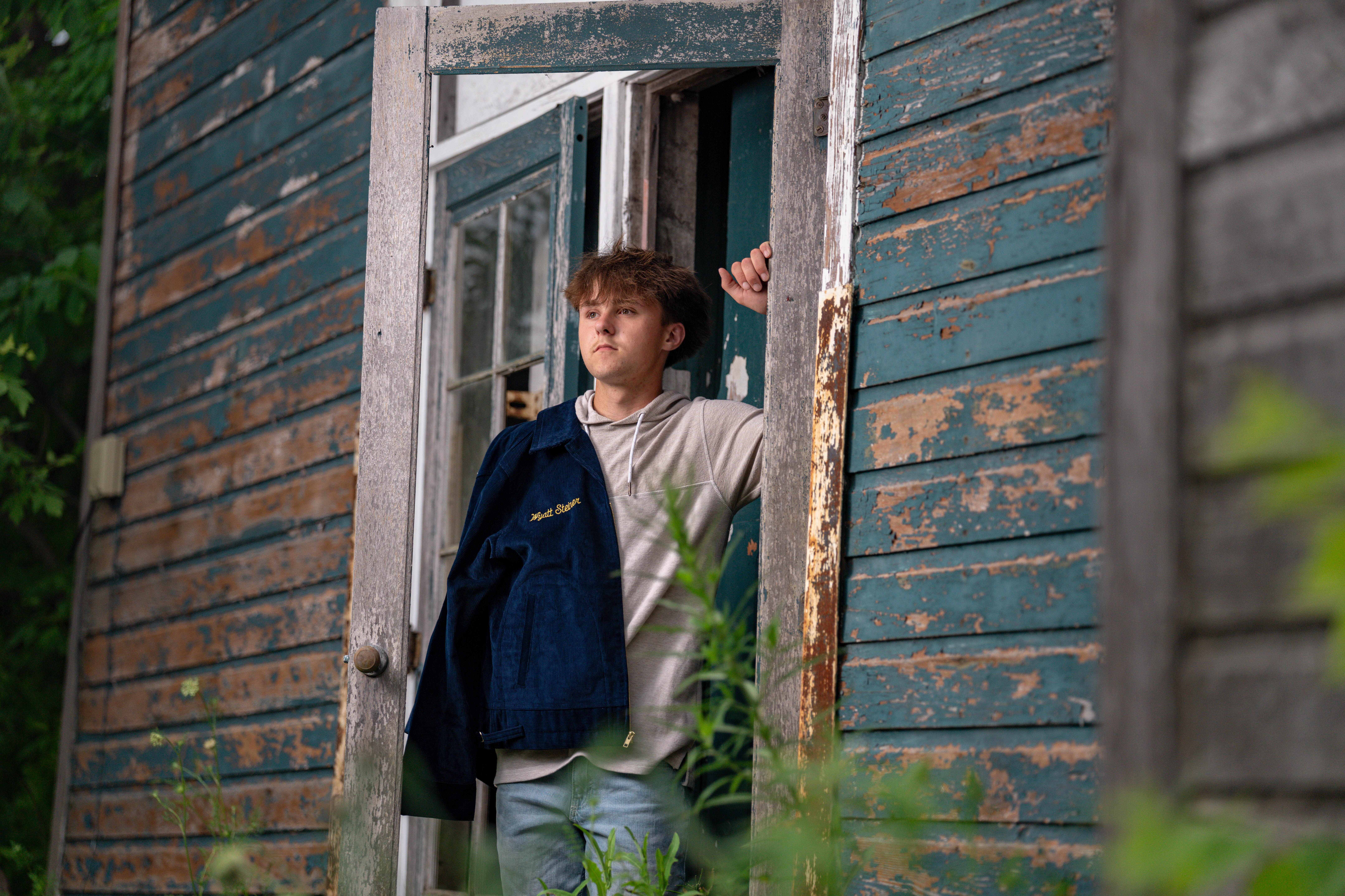 Click to View Larger Wyatt Steiner poses for a senior portrait session in Monroe, Wisconsin, on June 30, 2025. Steiner will be a Class of 2026 graduate. Photography by Ross Harried for Second Crop Creative.