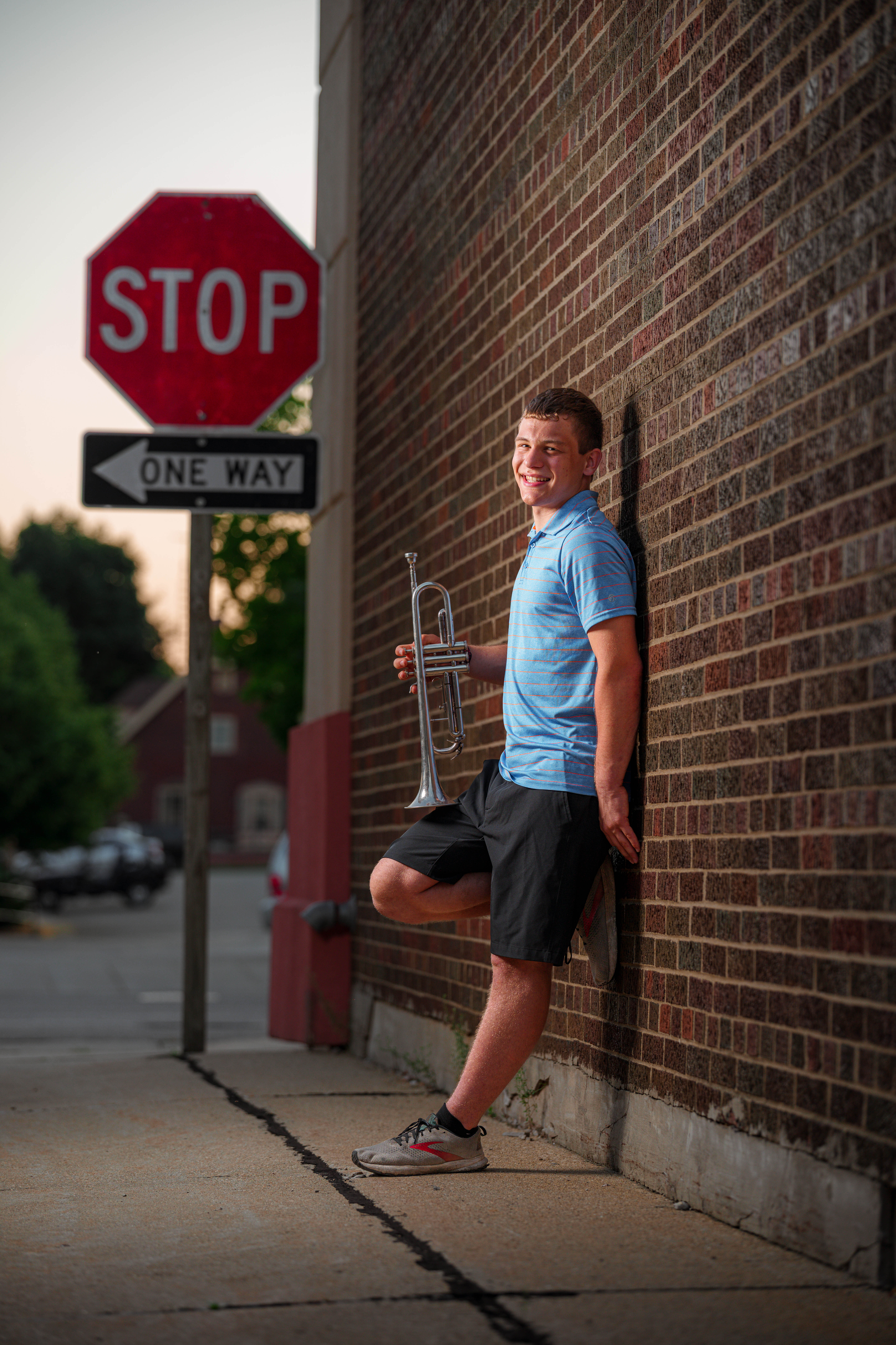 Connor Eckdhal poses for a senior portrait session in Monroe, Wisconsin, on July 8th, 2025. Eckdhal will be a Class of 2026 graduate. Photography by Ross Harried for Second Crop Creative.