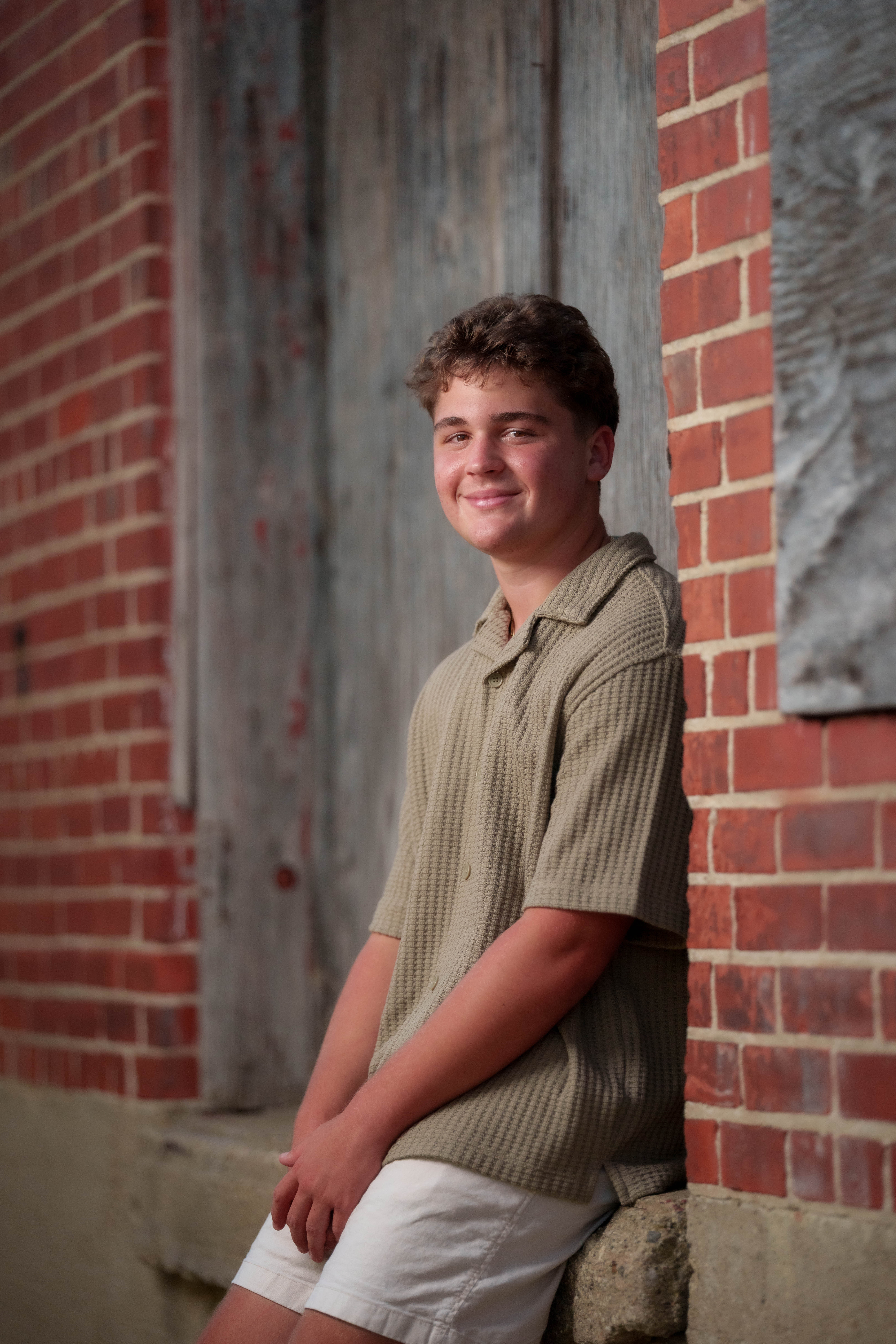 Click to View Larger Matt Roth poses for senior photos in New Glarus, Wisconsin on July 27th, 2025. Roth will graduate in 2026. Photography by Ross Harried for Second Crop Creative.