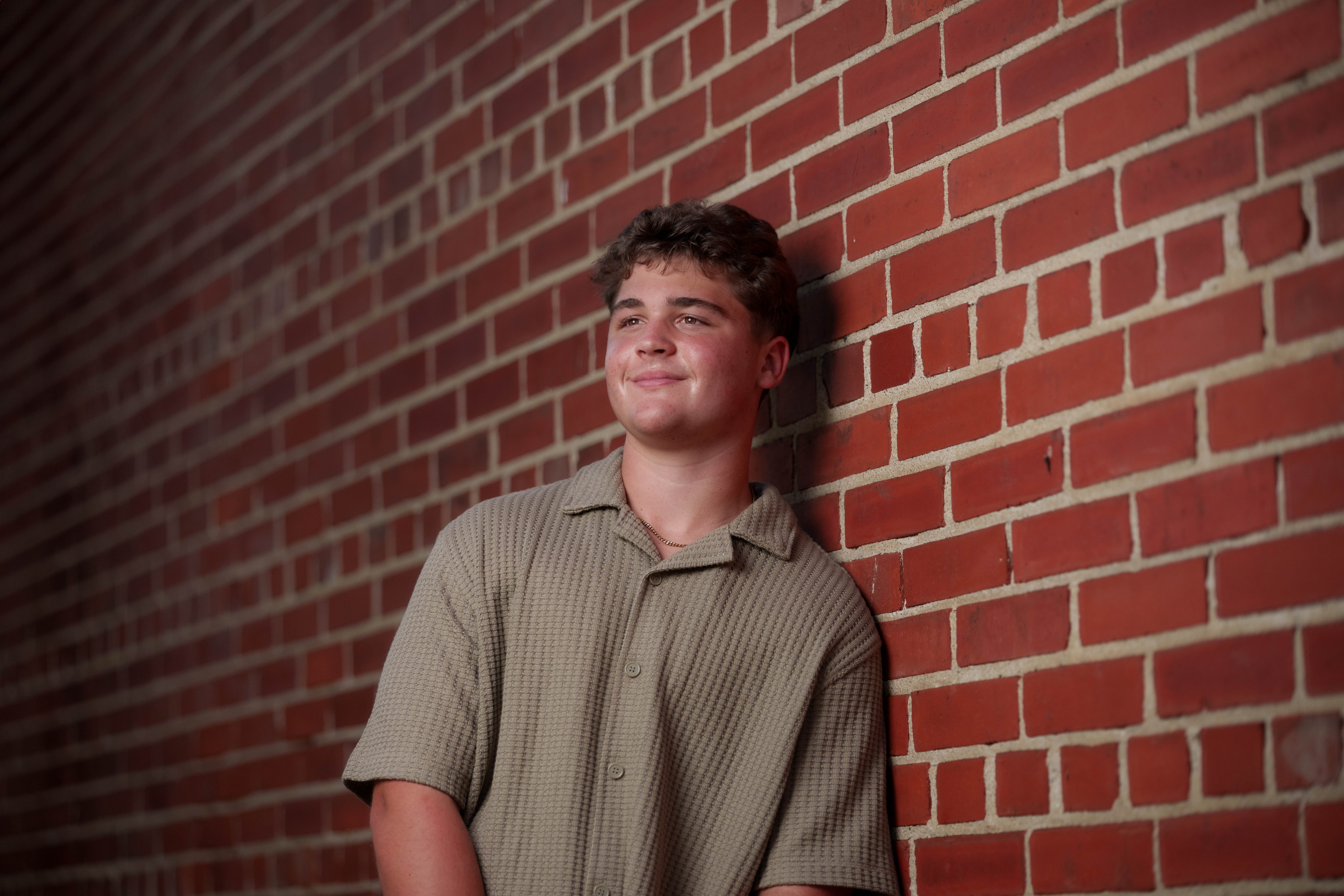 Click to View Larger Matt Roth poses for senior photos in New Glarus, Wisconsin on July 27th, 2025. Roth will graduate in 2026. Photography by Ross Harried for Second Crop Creative.