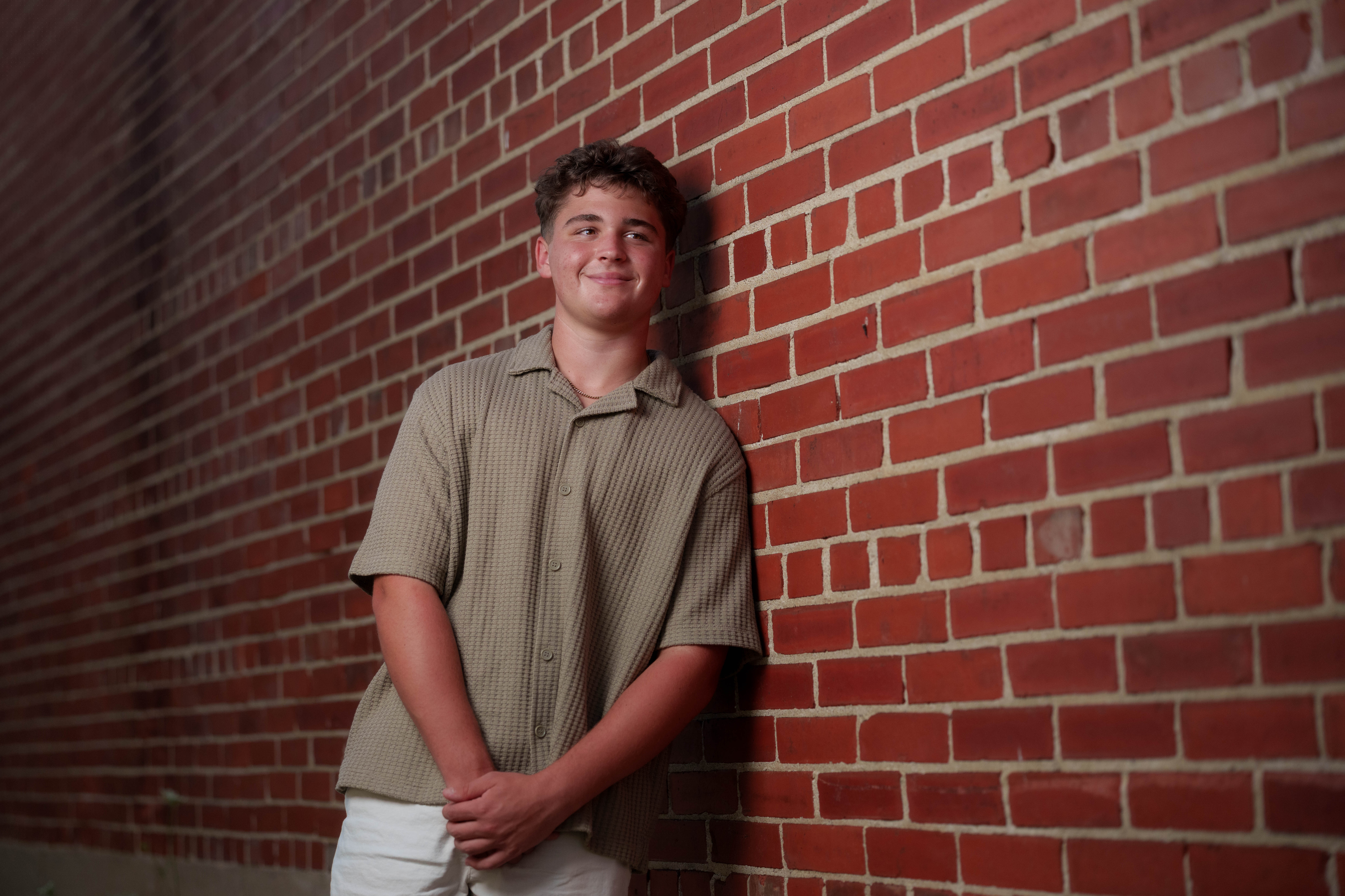 Click to View Larger Matt Roth poses for senior photos in New Glarus, Wisconsin on July 27th, 2025. Roth will graduate in 2026. Photography by Ross Harried for Second Crop Creative.