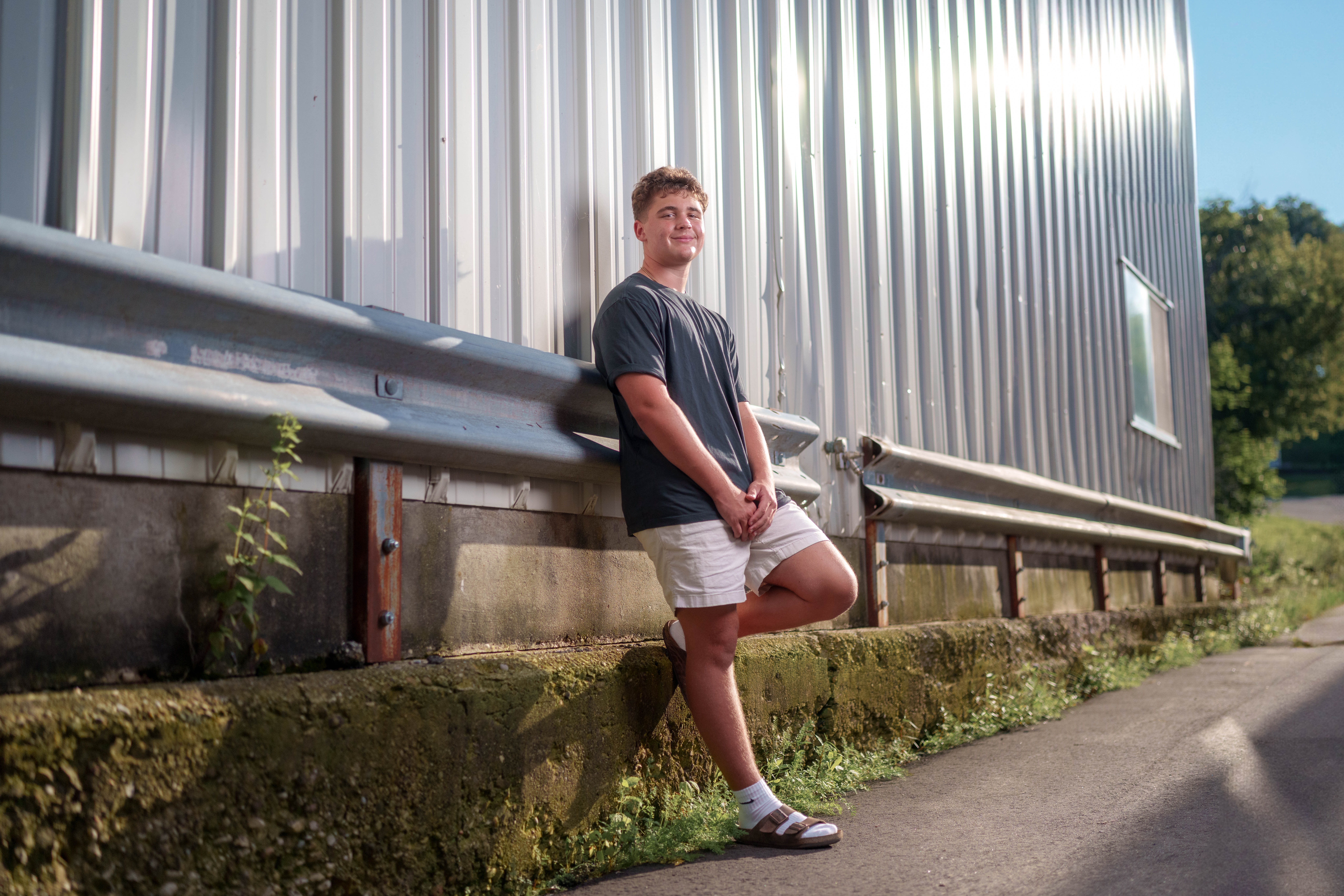Click to View Larger Matt Roth poses for senior photos in New Glarus, Wisconsin on July 27th, 2025. Roth will graduate in 2026. Photography by Ross Harried for Second Crop Creative.