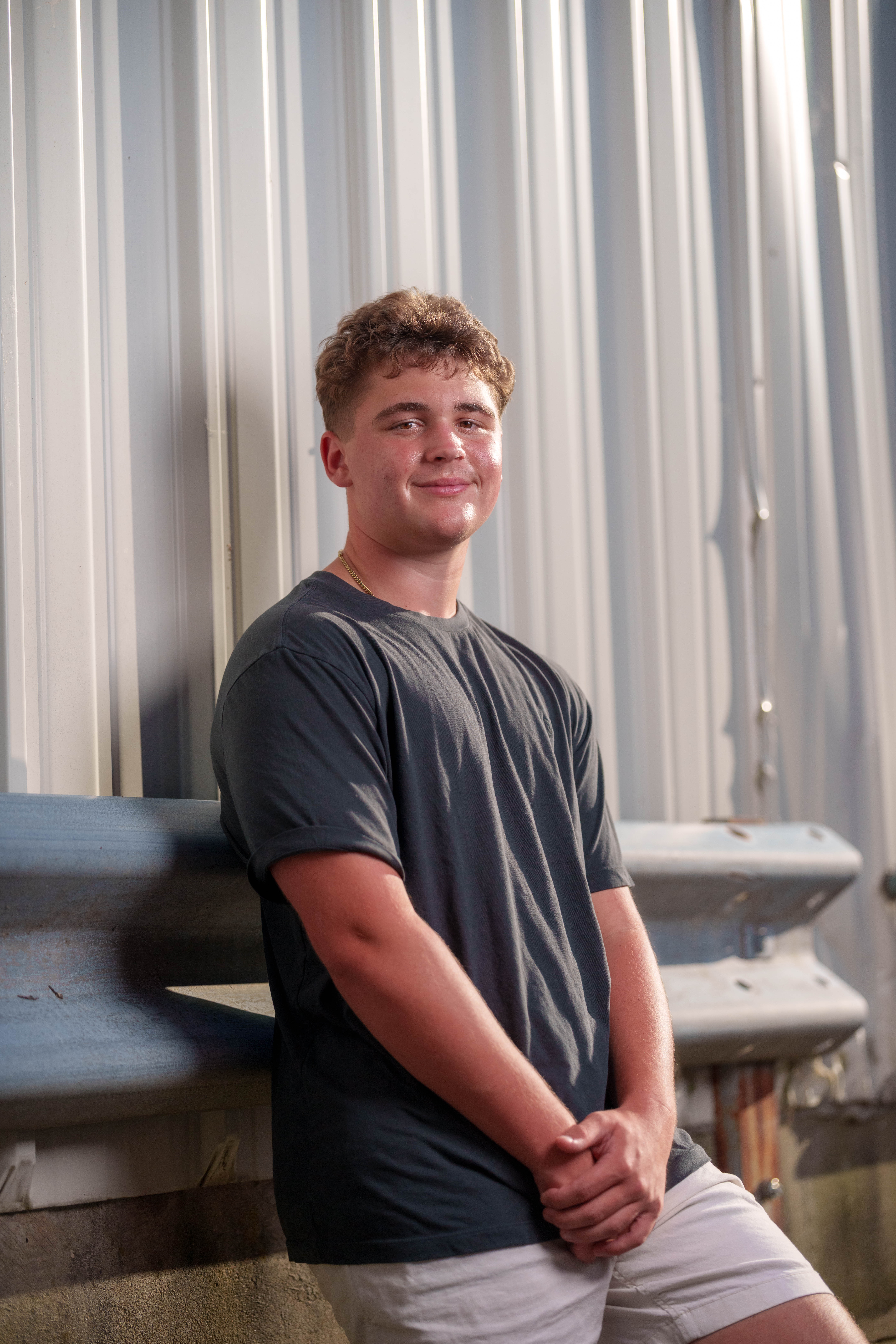 Click to View Larger Matt Roth poses for senior photos in New Glarus, Wisconsin on July 27th, 2025. Roth will graduate in 2026. Photography by Ross Harried for Second Crop Creative.