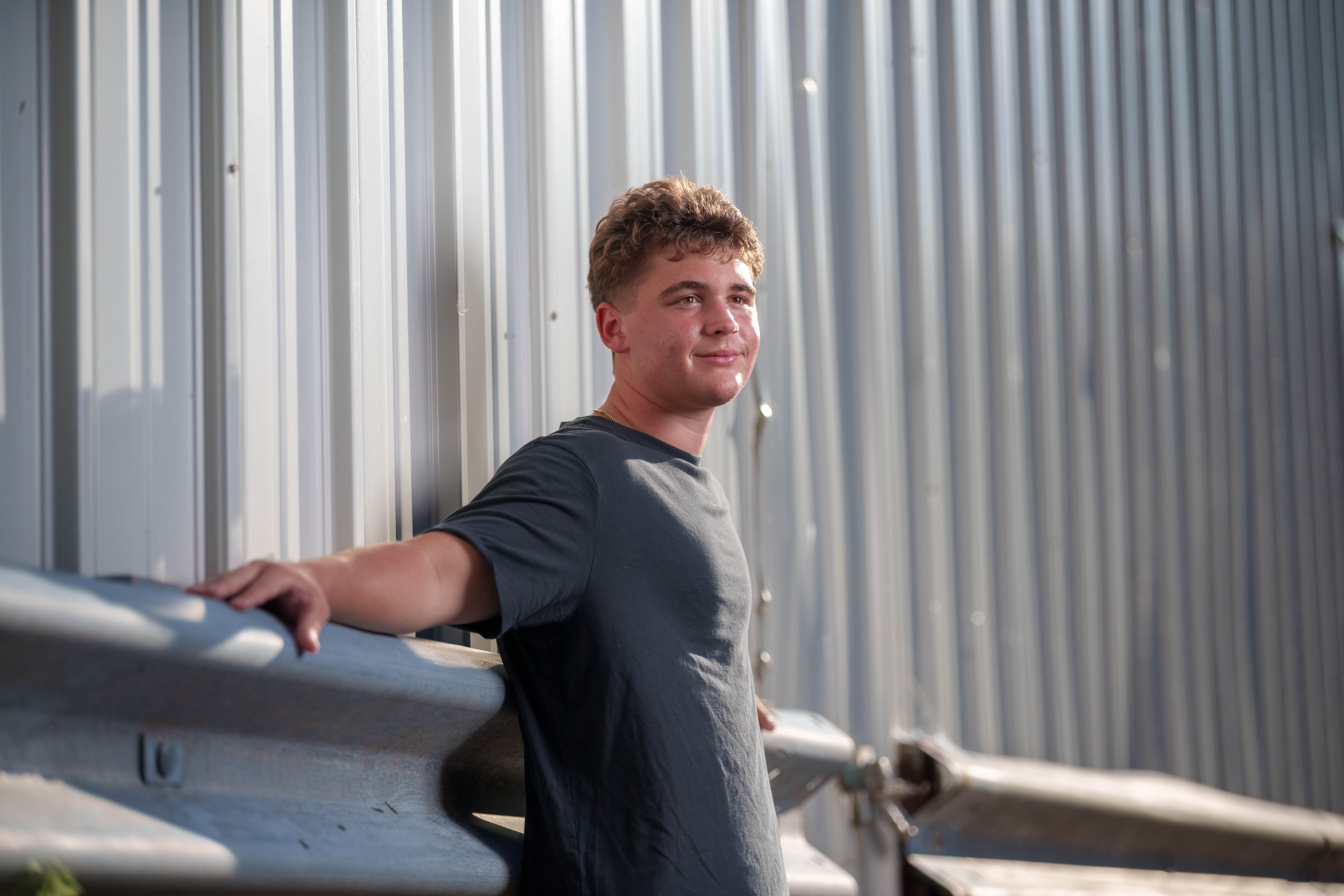 Click to View Larger Matt Roth poses for senior photos in New Glarus, Wisconsin on July 27th, 2025. Roth will graduate in 2026. Photography by Ross Harried for Second Crop Creative.