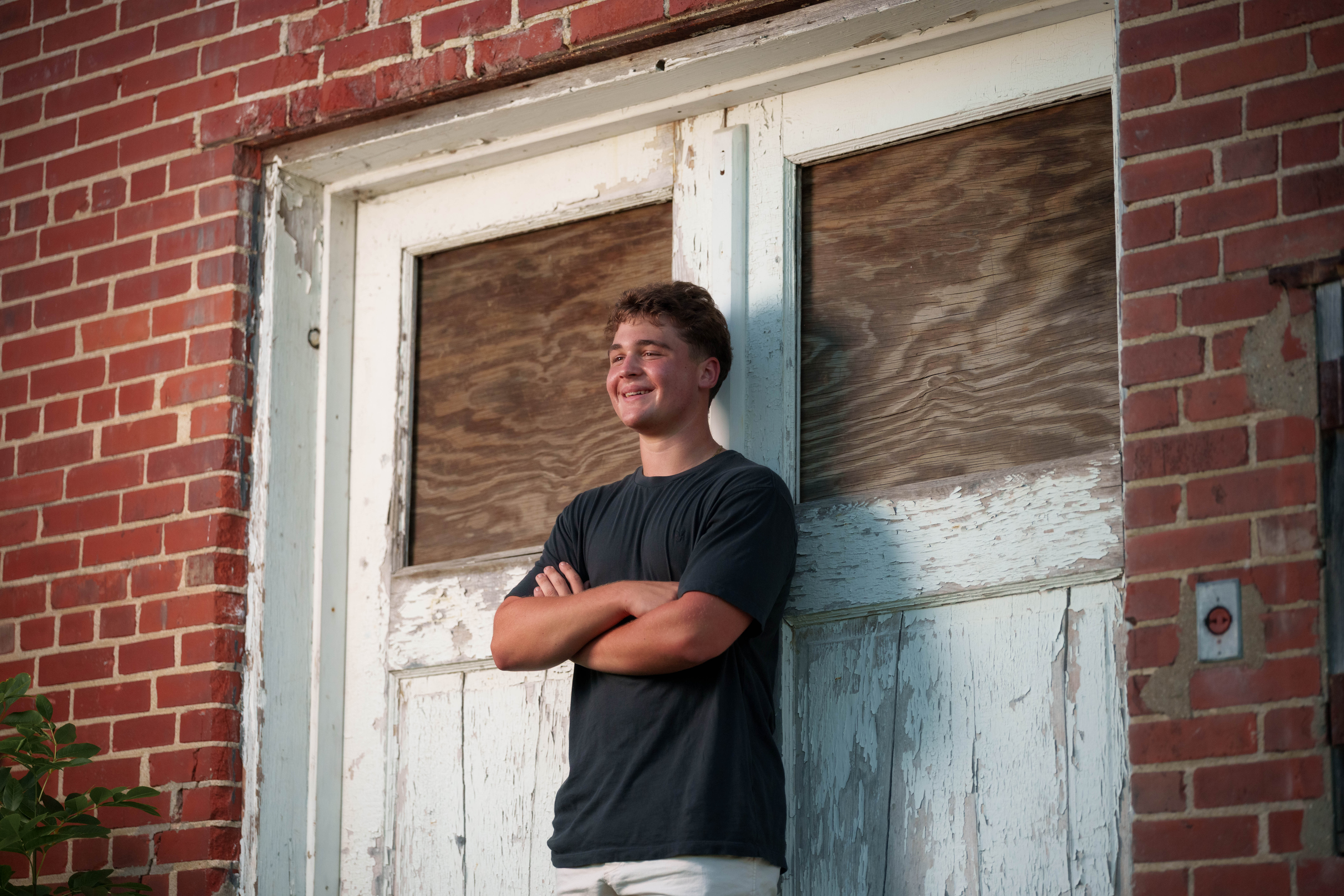 Click to View Larger Matt Roth poses for senior photos in New Glarus, Wisconsin on July 27th, 2025. Roth will graduate in 2026. Photography by Ross Harried for Second Crop Creative.