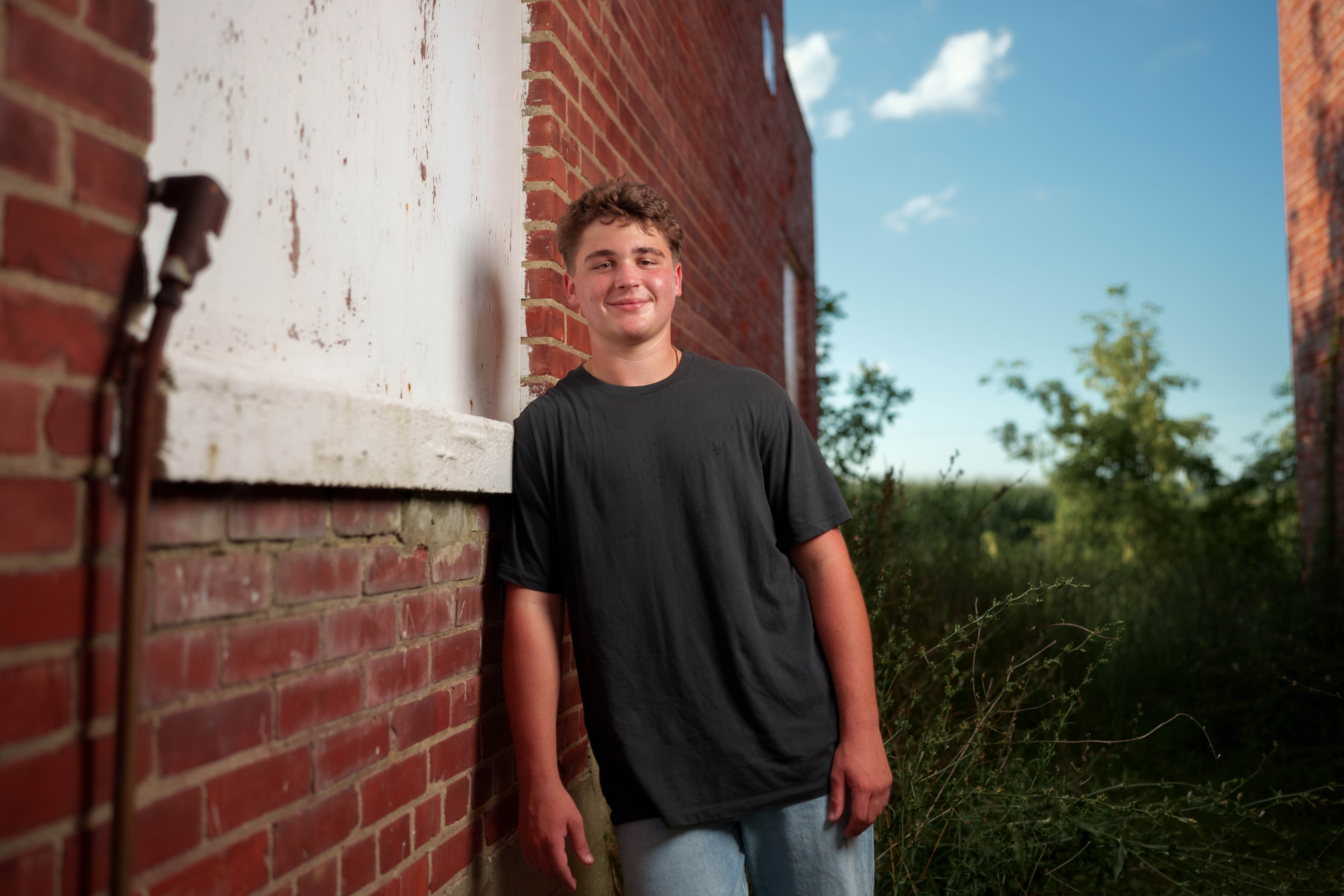 Click to View Larger Matt Roth poses for senior photos in New Glarus, Wisconsin on July 27th, 2025. Roth will graduate in 2026. Photography by Ross Harried for Second Crop Creative.