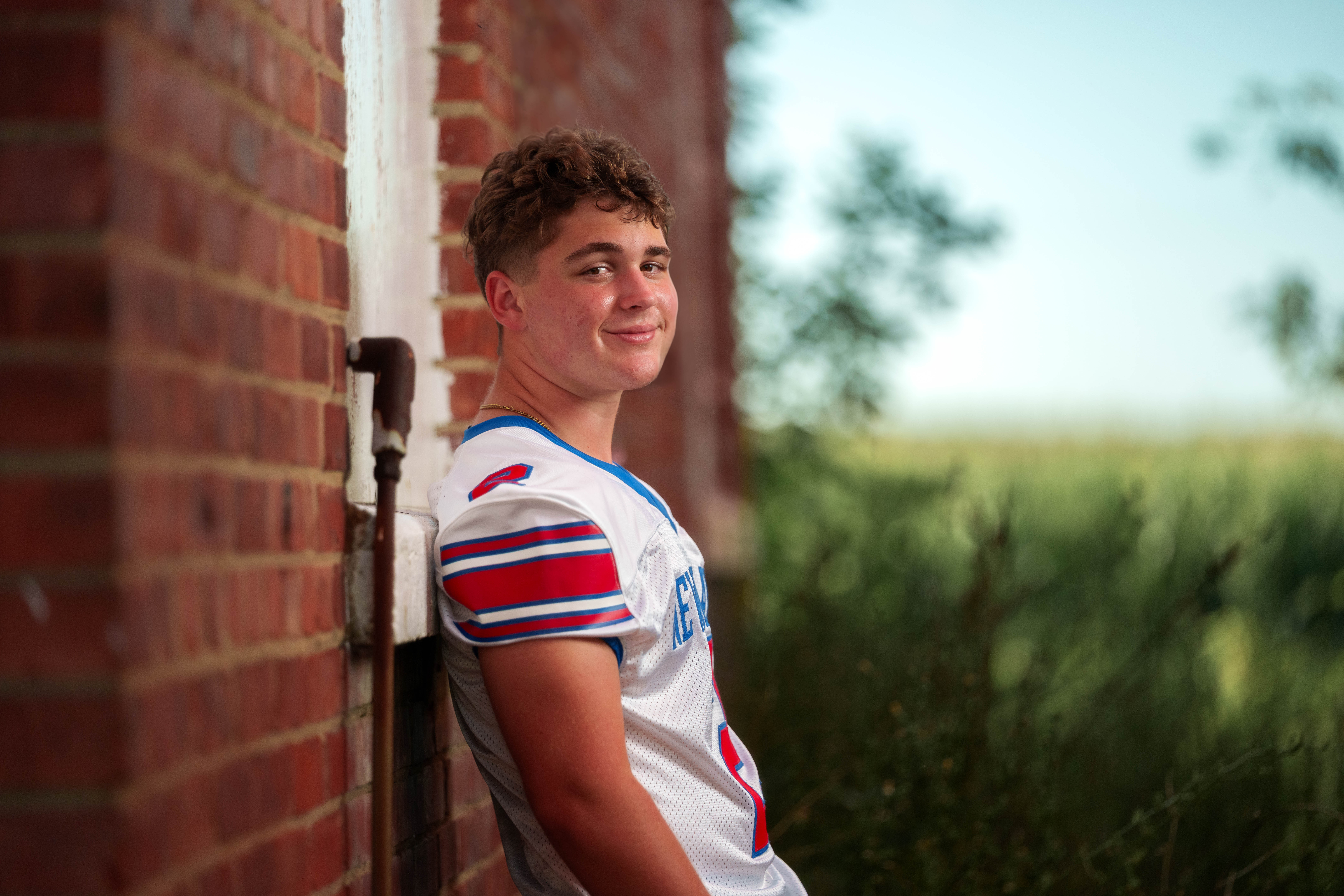 Click to View Larger Matt Roth poses for senior photos in New Glarus, Wisconsin on July 27th, 2025. Roth will graduate in 2026. Photography by Ross Harried for Second Crop Creative.