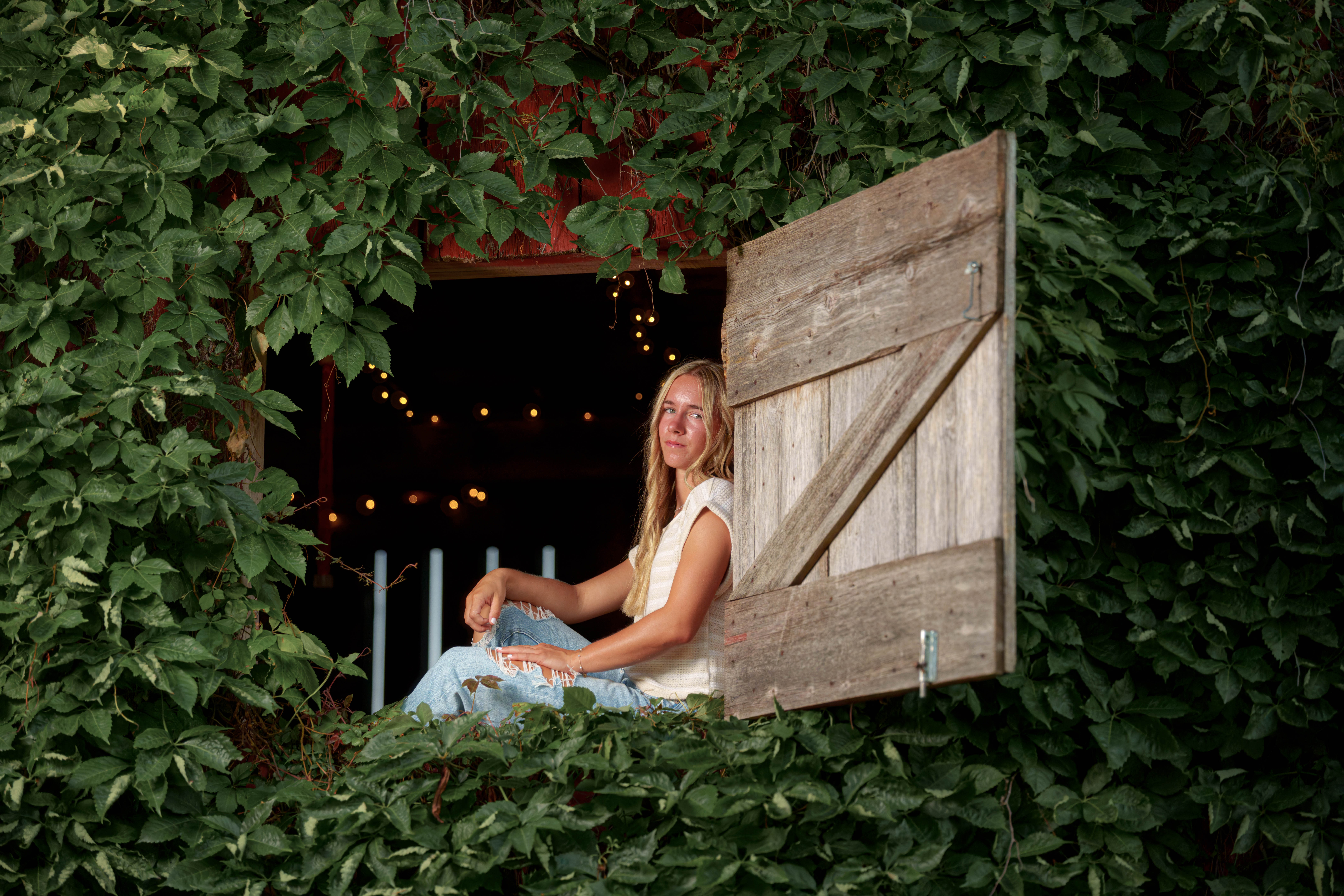 Click to View Larger Molly Olson poses for her senior portraits at Pheasant Valley Barn in Brooklyn, Wisconsin on July 29th, 2025. Olson will be graduating in 2026. Photography by Ross Harried for Second Crop Creative.