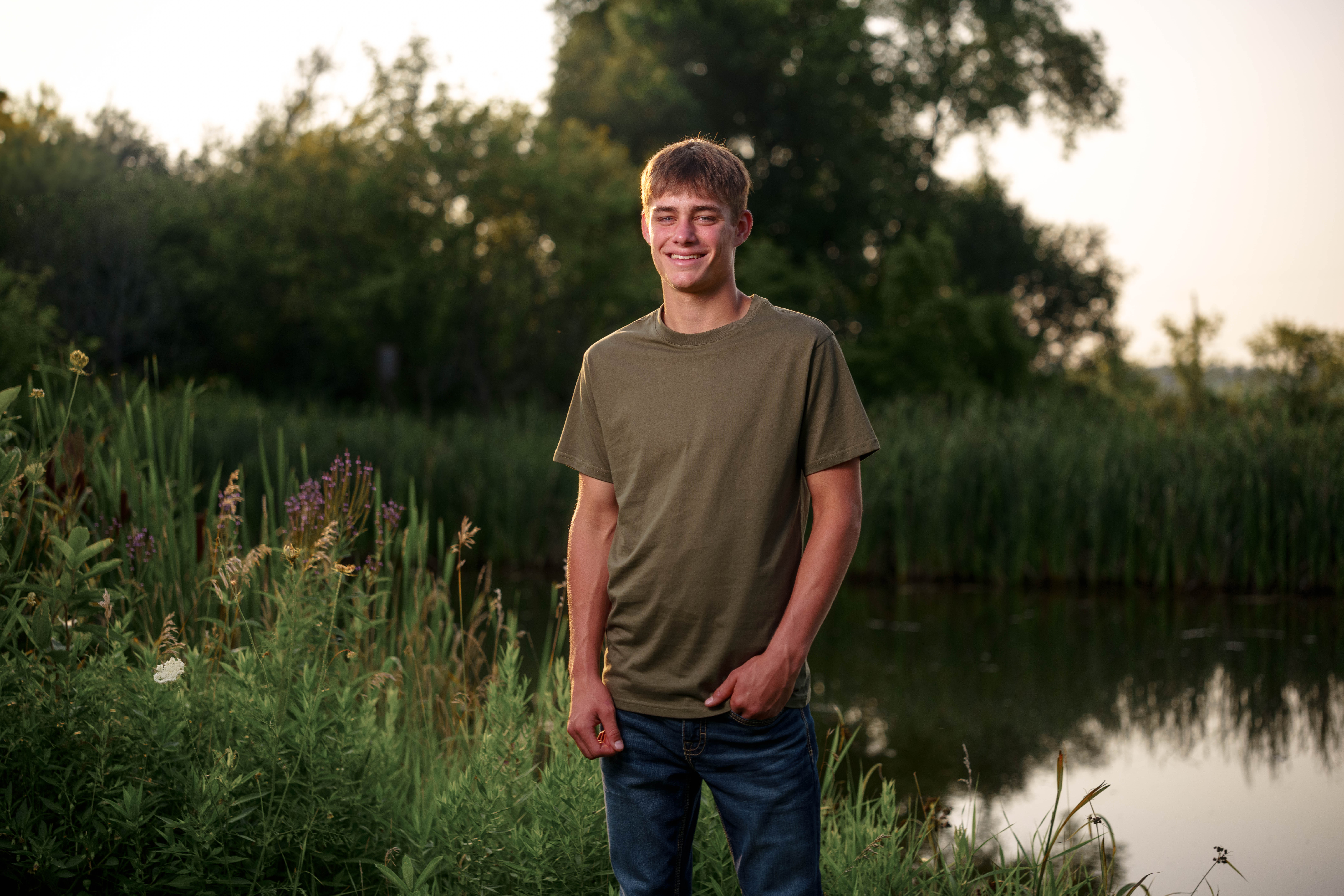 Jayden Brown poses for senior photos near Juda, Wisconsin on August 4th, 2025. Brown will graduate in 2026. Photography by Ross Harried for Second Crop Creative.
