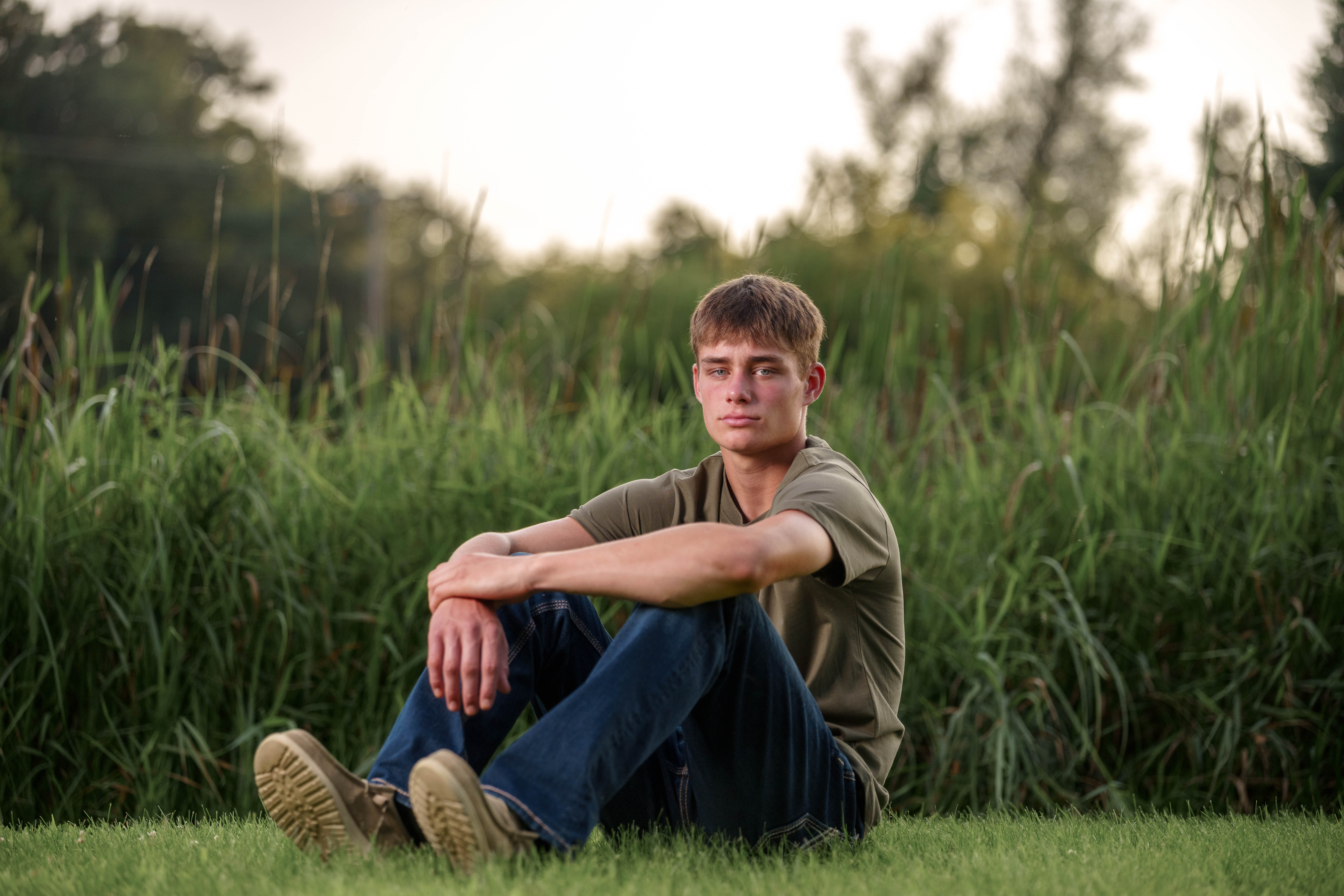 Jayden Brown poses for senior photos near Juda, Wisconsin on August 4th, 2025. Brown will graduate in 2026. Photography by Ross Harried for Second Crop Creative.