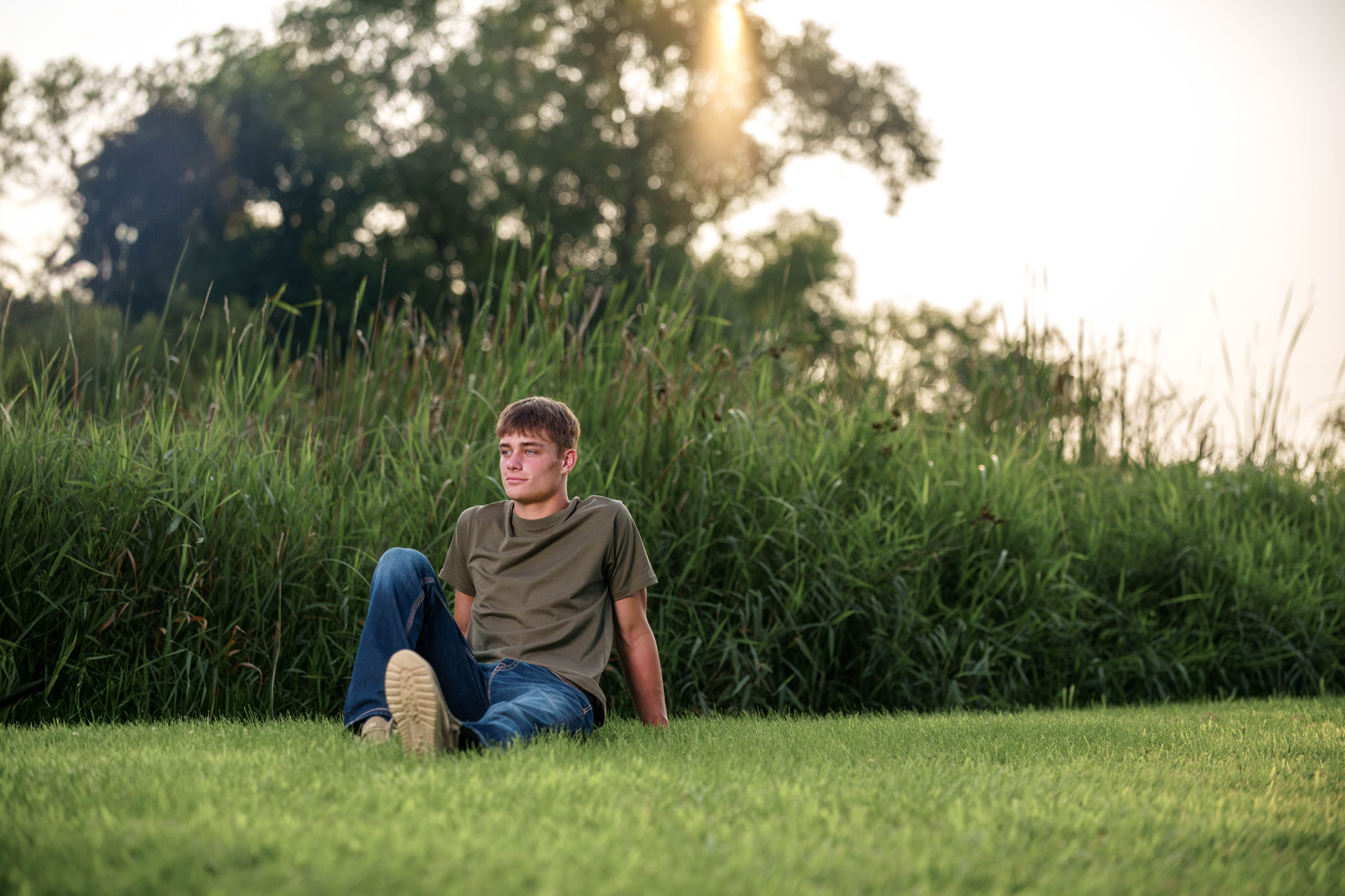 Jayden Brown poses for senior photos near Juda, Wisconsin on August 4th, 2025. Brown will graduate in 2026. Photography by Ross Harried for Second Crop Creative.