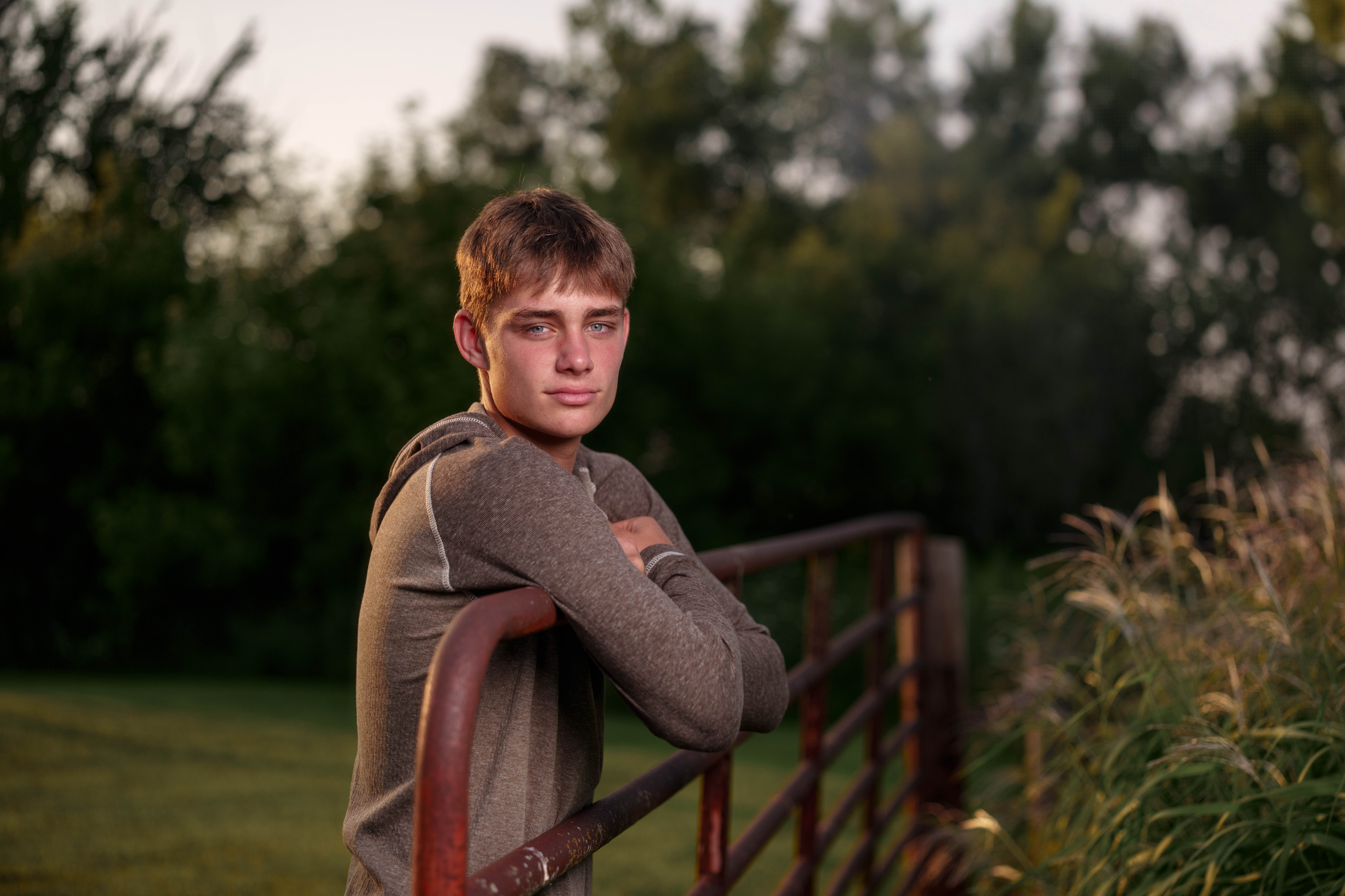 Jayden Brown poses for senior photos near Juda, Wisconsin on August 4th, 2025. Brown will graduate in 2026. Photography by Ross Harried for Second Crop Creative.