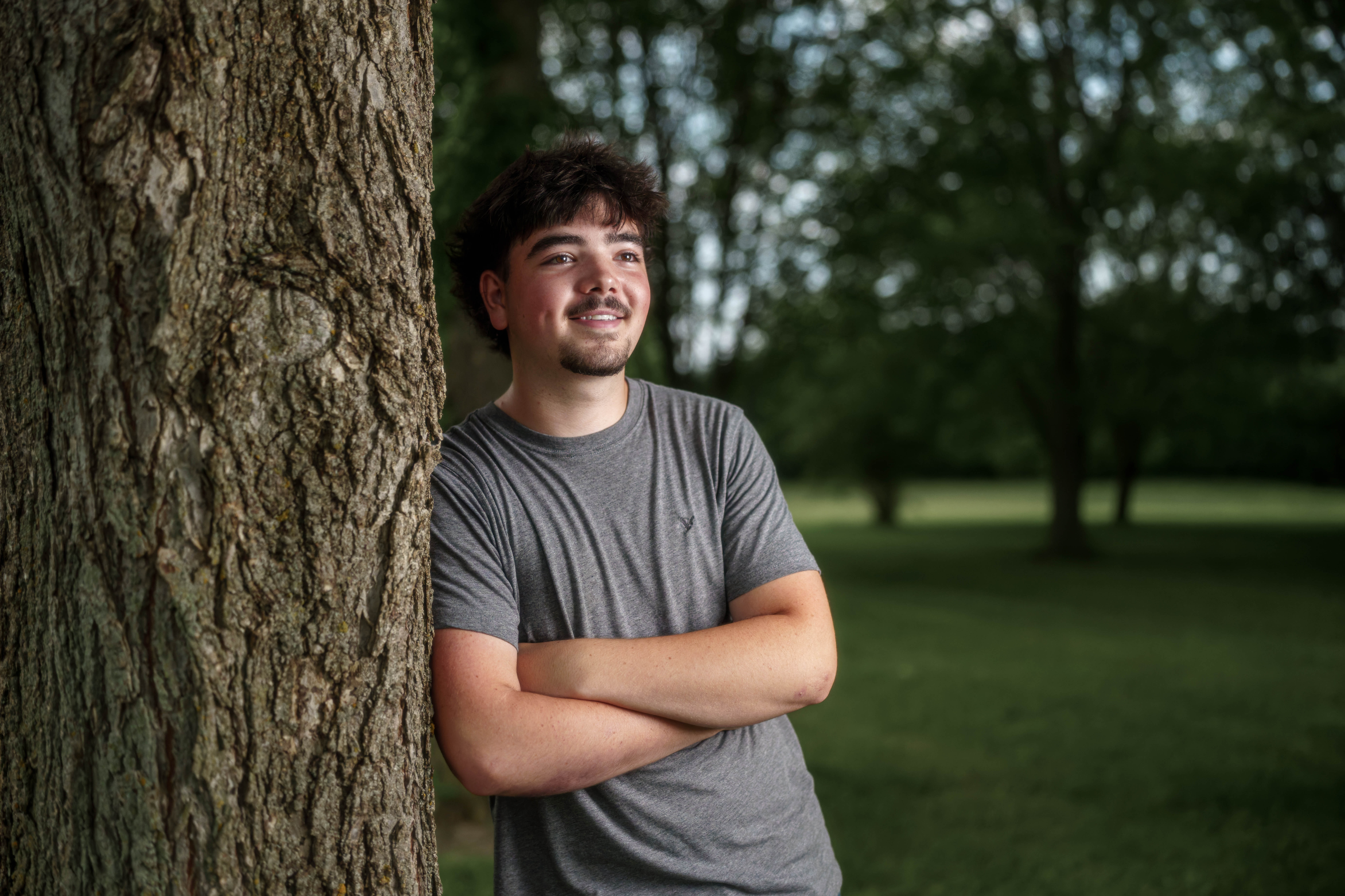Brady Stuart poses for senior photos outside Monroe Wisconsin on August 4th, 2025. Stuart will graduate in 2026. Photography by Ross Harried for Second Crop Creative.