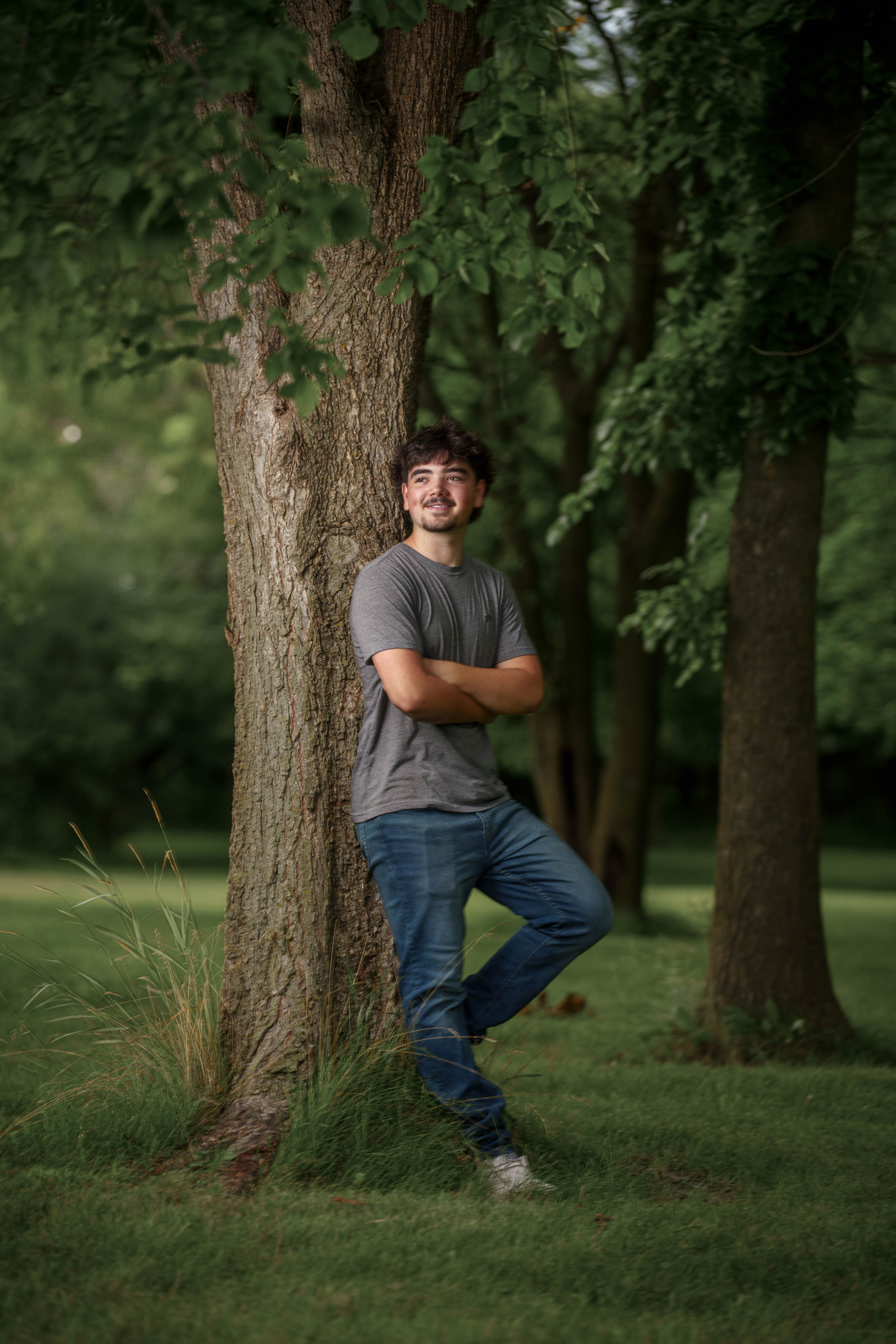 Brady Stuart poses for senior photos outside Monroe Wisconsin on August 4th, 2025. Stuart will graduate in 2026. Photography by Ross Harried for Second Crop Creative.