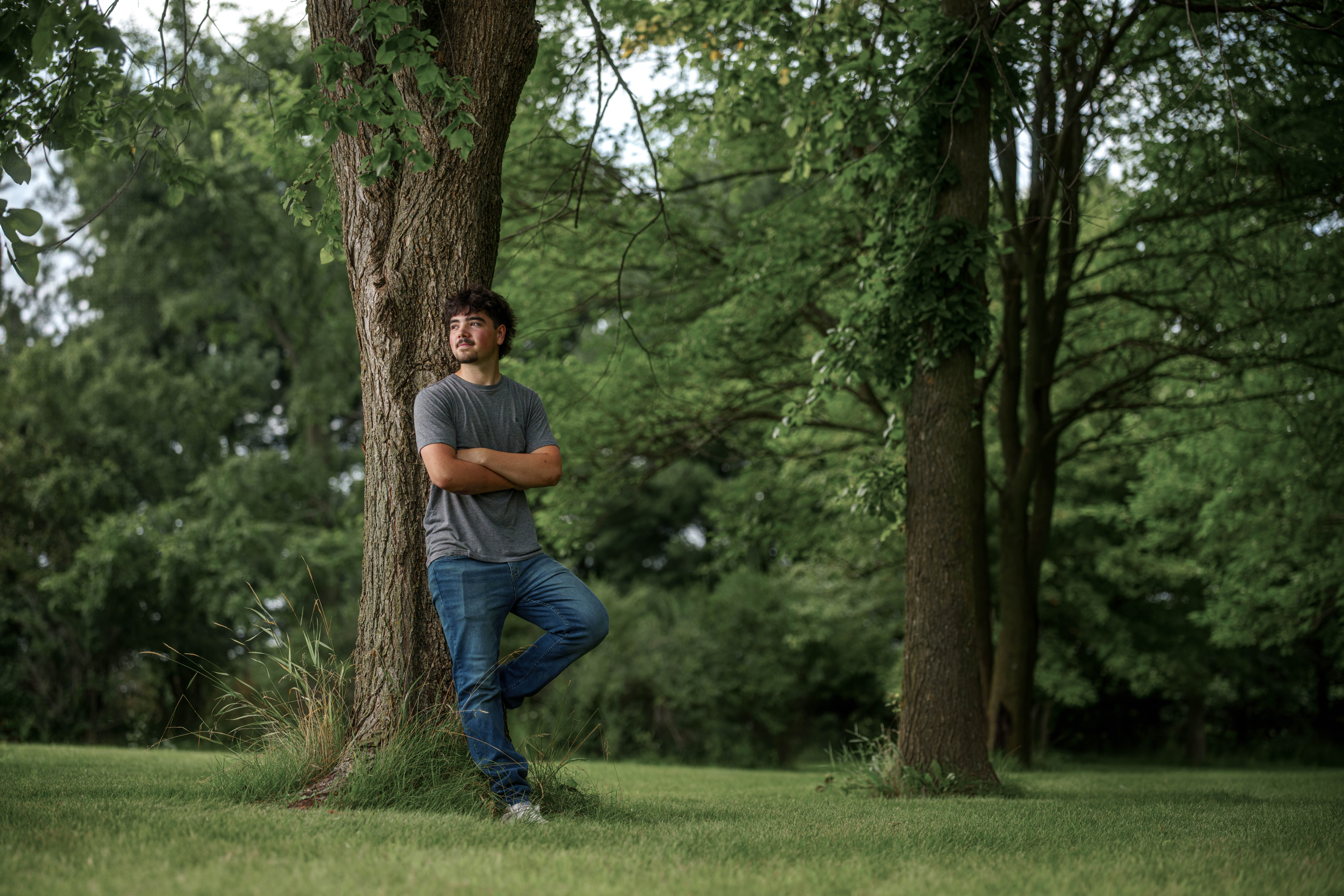 Brady Stuart poses for senior photos outside Monroe Wisconsin on August 4th, 2025. Stuart will graduate in 2026. Photography by Ross Harried for Second Crop Creative.