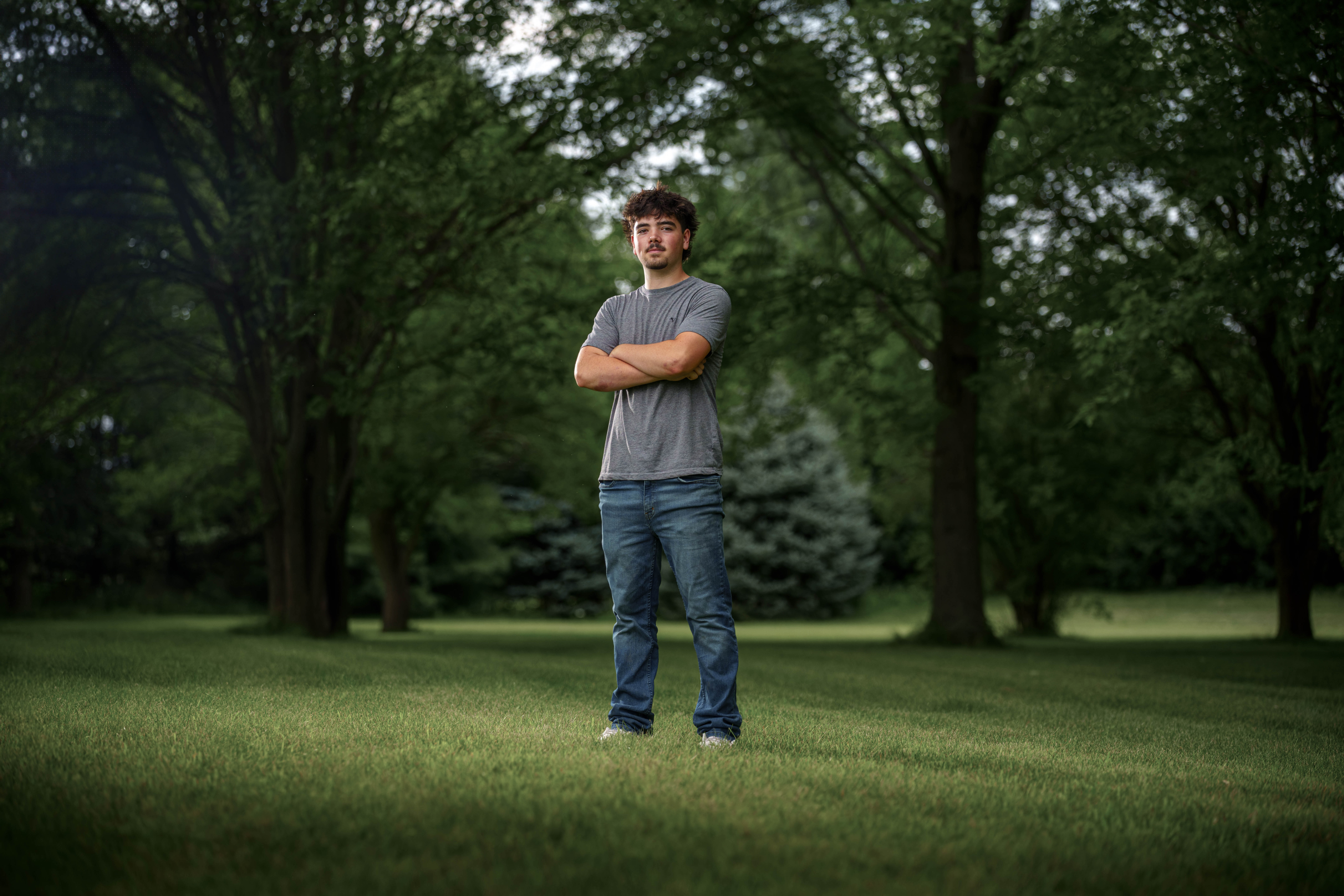 Brady Stuart poses for senior photos outside Monroe Wisconsin on August 4th, 2025. Stuart will graduate in 2026. Photography by Ross Harried for Second Crop Creative.