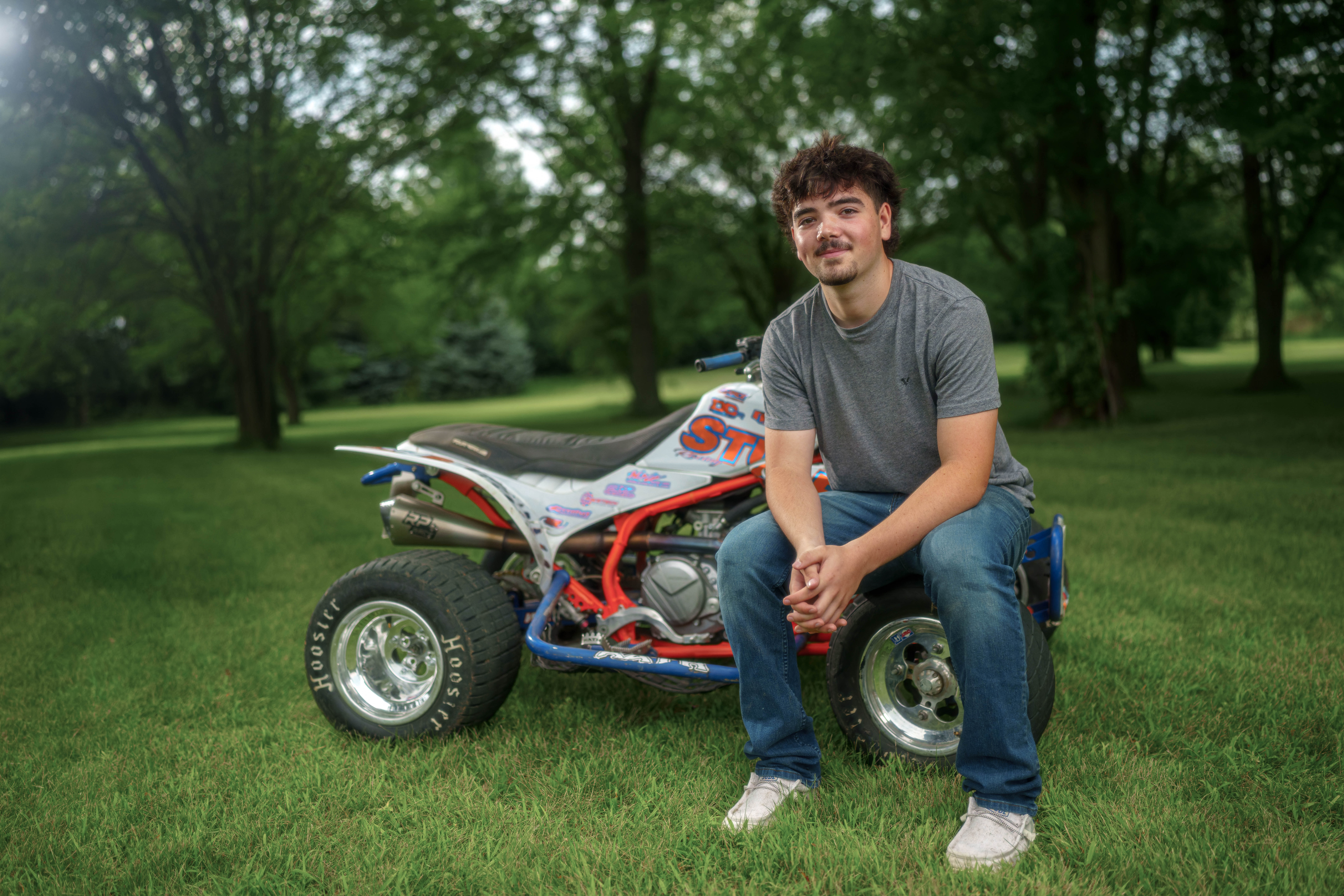 Brady Stuart poses for senior photos outside Monroe Wisconsin on August 4th, 2025. Stuart will graduate in 2026. Photography by Ross Harried for Second Crop Creative.