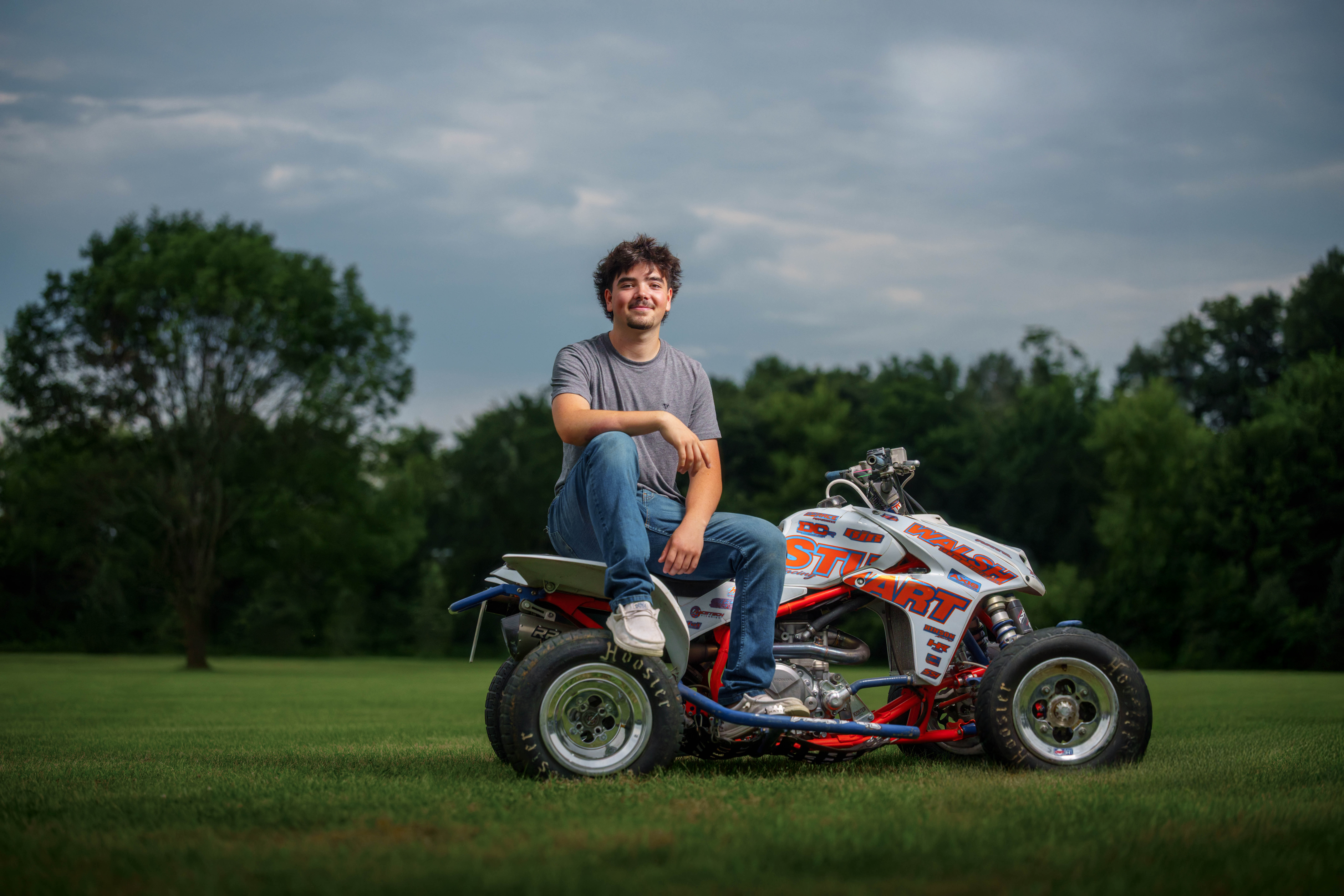 Brady Stuart poses for senior photos outside Monroe Wisconsin on August 4th, 2025. Stuart will graduate in 2026. Photography by Ross Harried for Second Crop Creative.