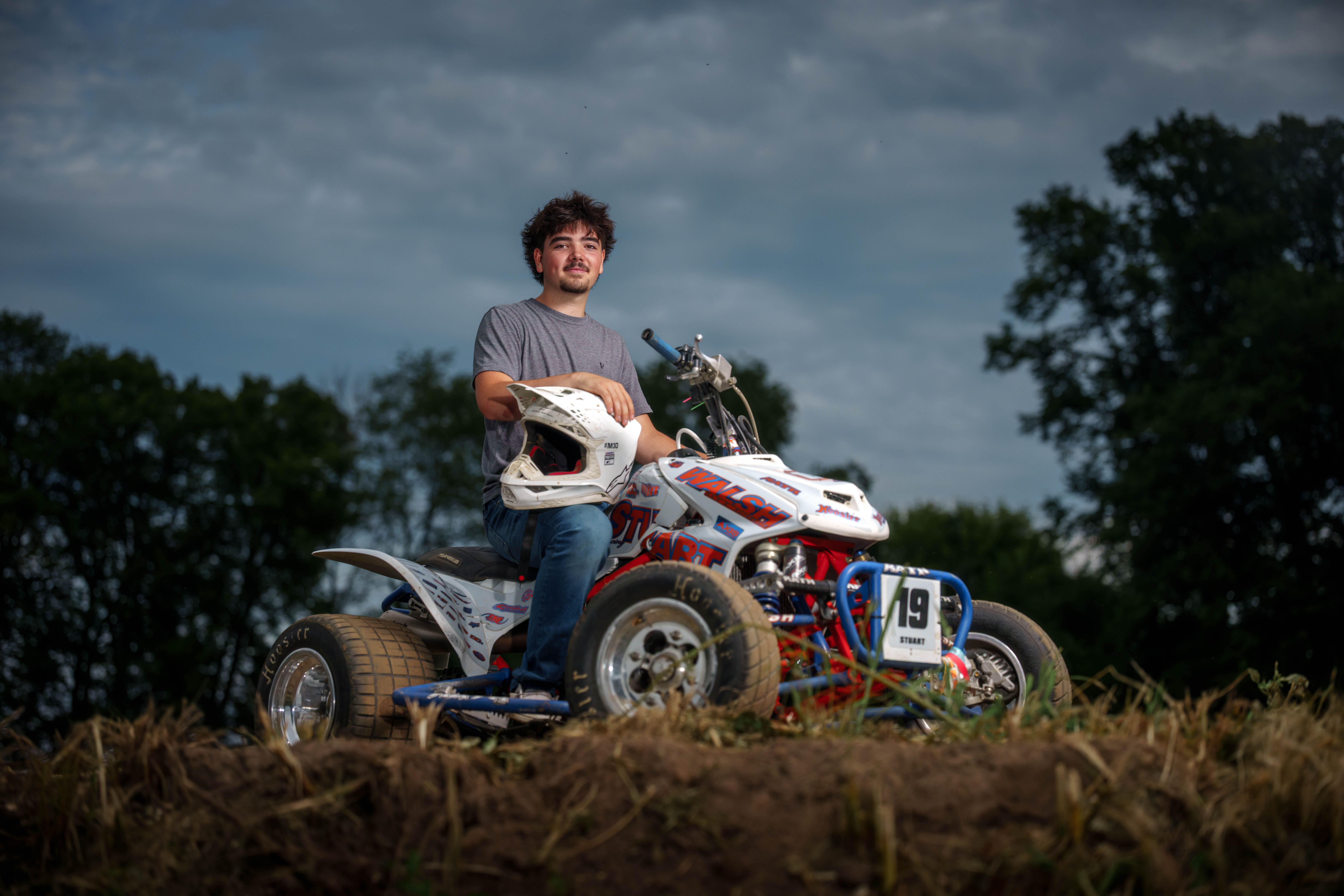 Brady Stuart poses for senior photos outside Monroe Wisconsin on August 4th, 2025. Stuart will graduate in 2026. Photography by Ross Harried for Second Crop Creative.