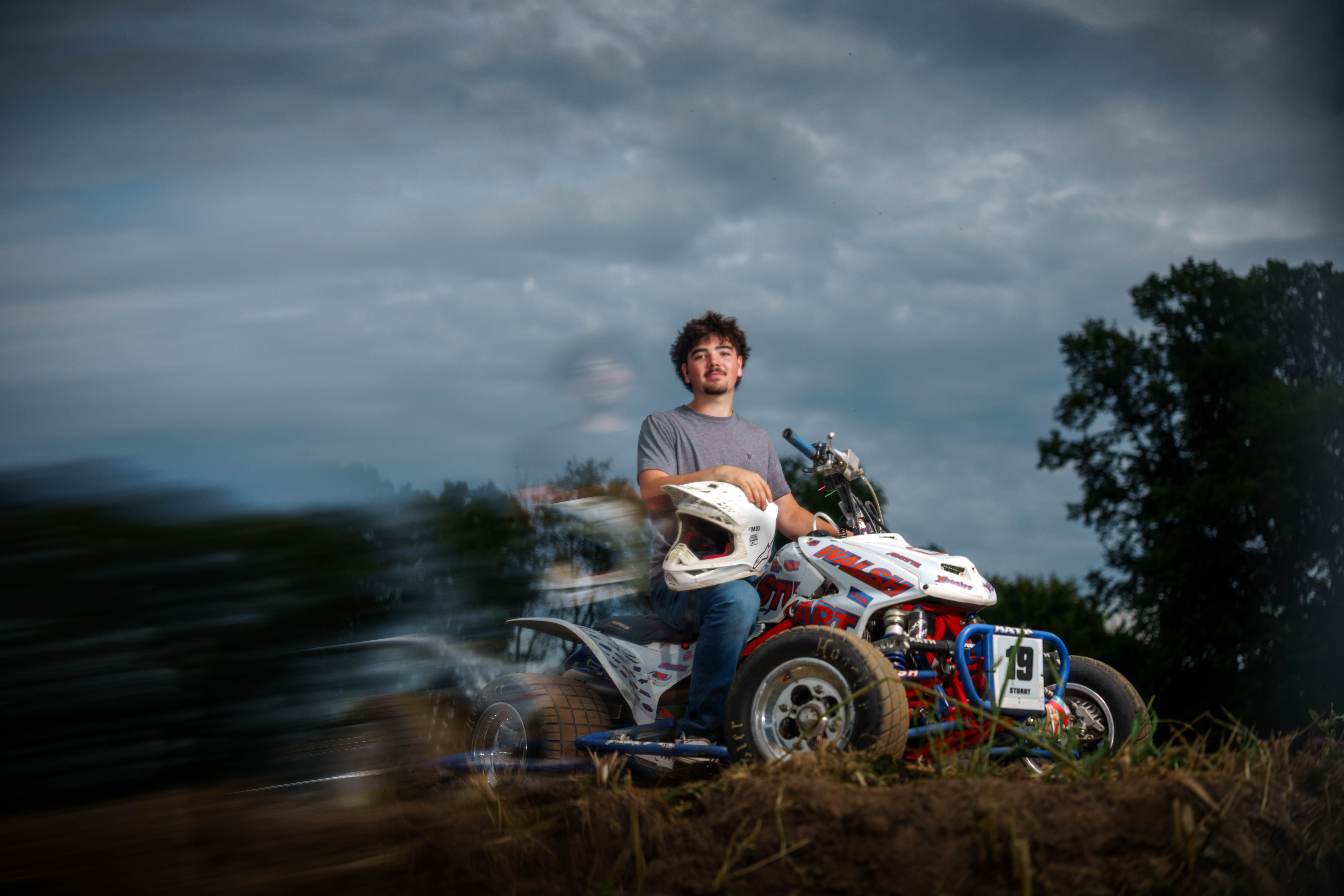 Brady Stuart poses for senior photos outside Monroe Wisconsin on August 4th, 2025. Stuart will graduate in 2026. Photography by Ross Harried for Second Crop Creative.