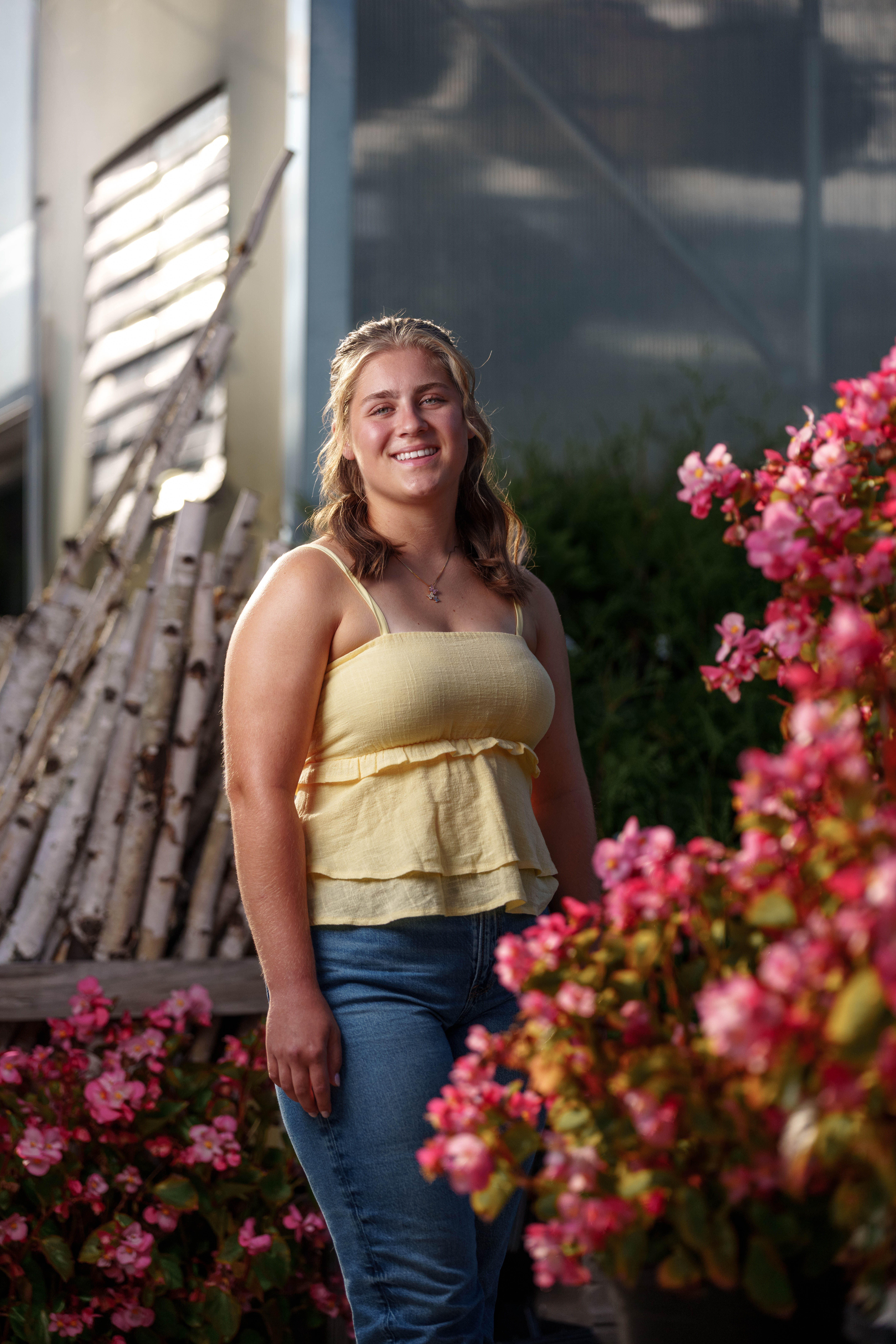 Shannon Weber poses for senior photos at Parrfection Produce Farm Market outside Monticello Wisconsin on August 7th, 2025. Weber will graduate in 2026. Photography by Ross Harried for Second Crop Creative.