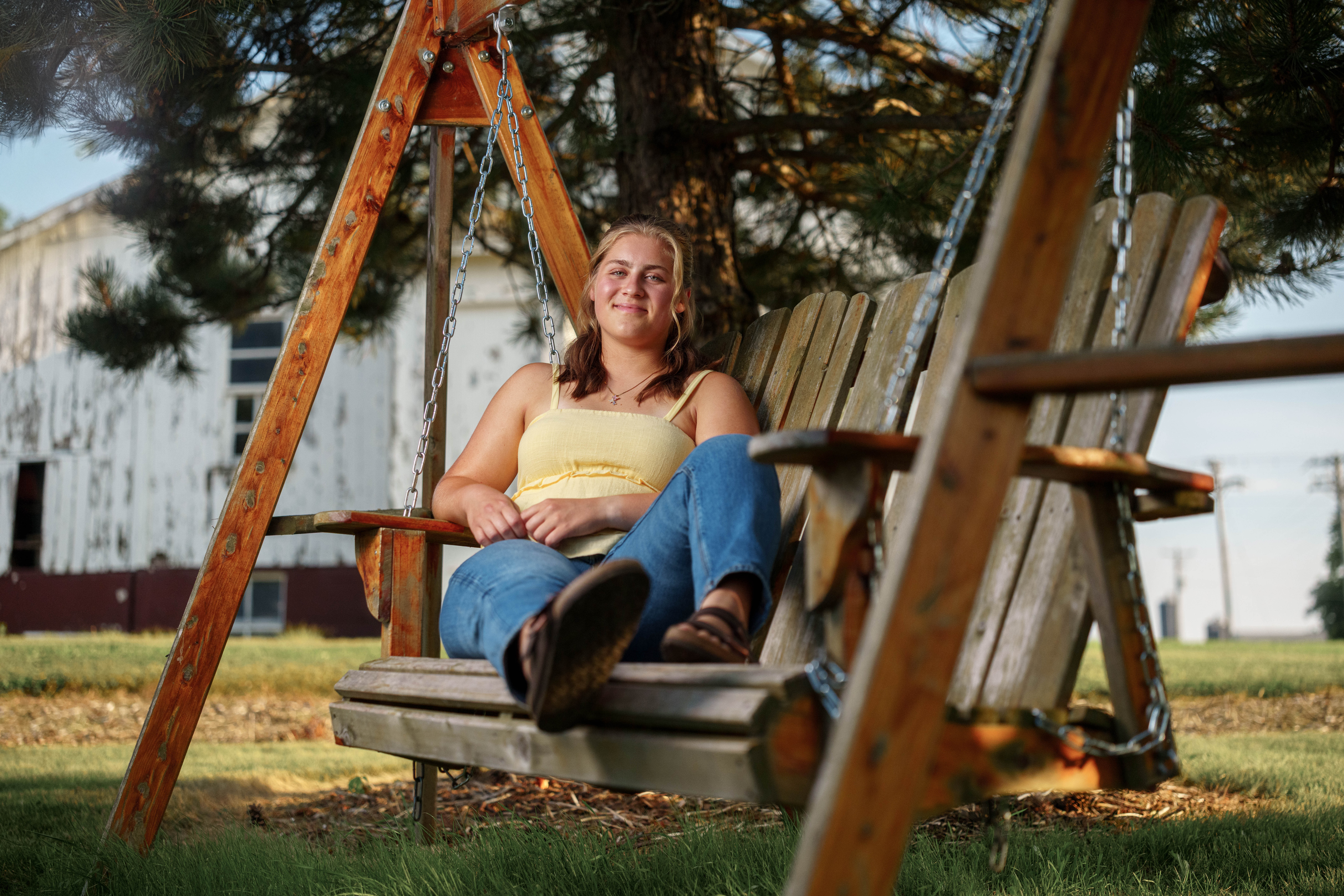 Shannon Weber poses for senior photos at Parrfection Produce Farm Market outside Monticello Wisconsin on August 7th, 2025. Weber will graduate in 2026. Photography by Ross Harried for Second Crop Creative.
