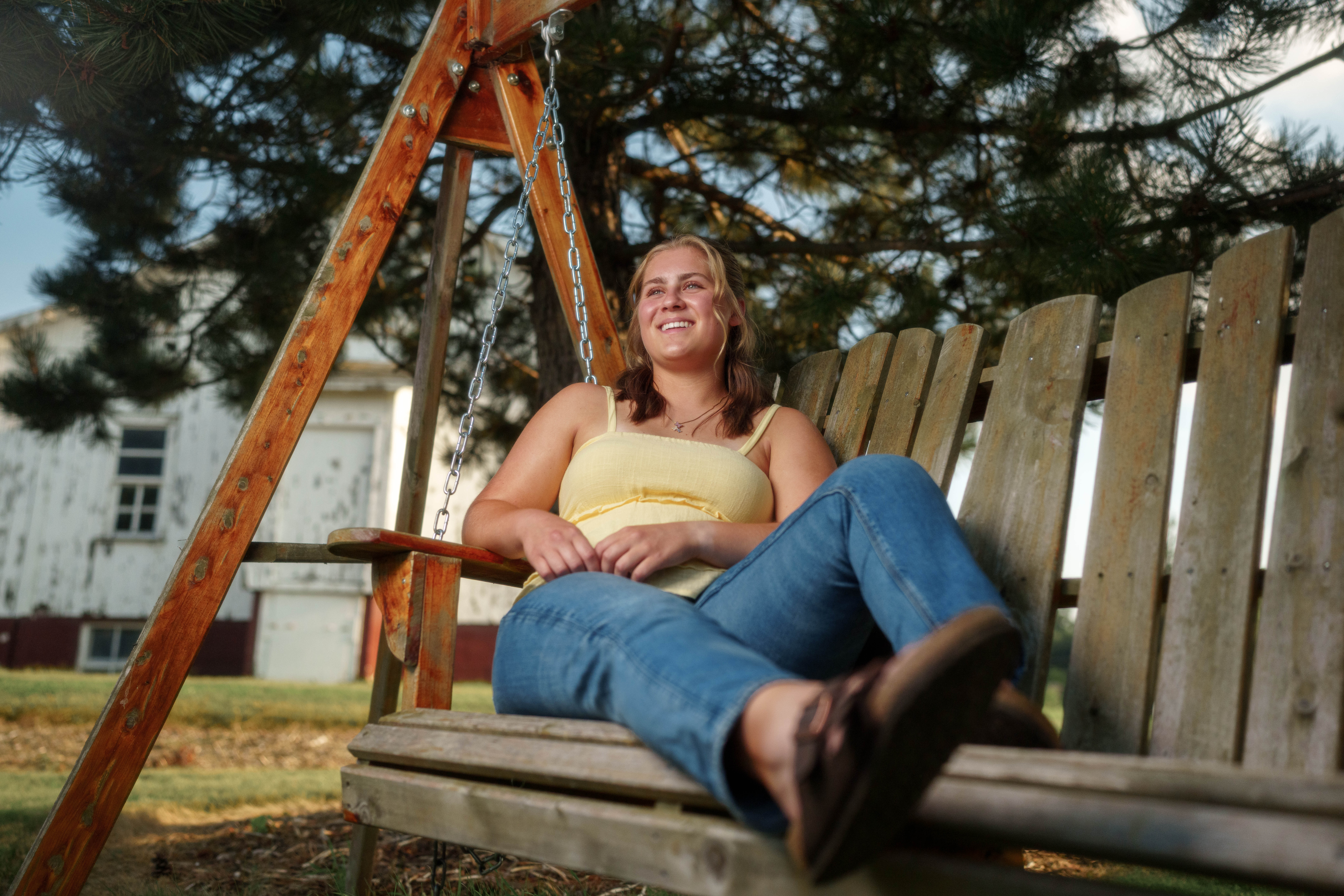 Shannon Weber poses for senior photos at Parrfection Produce Farm Market outside Monticello Wisconsin on August 7th, 2025. Weber will graduate in 2026. Photography by Ross Harried for Second Crop Creative.