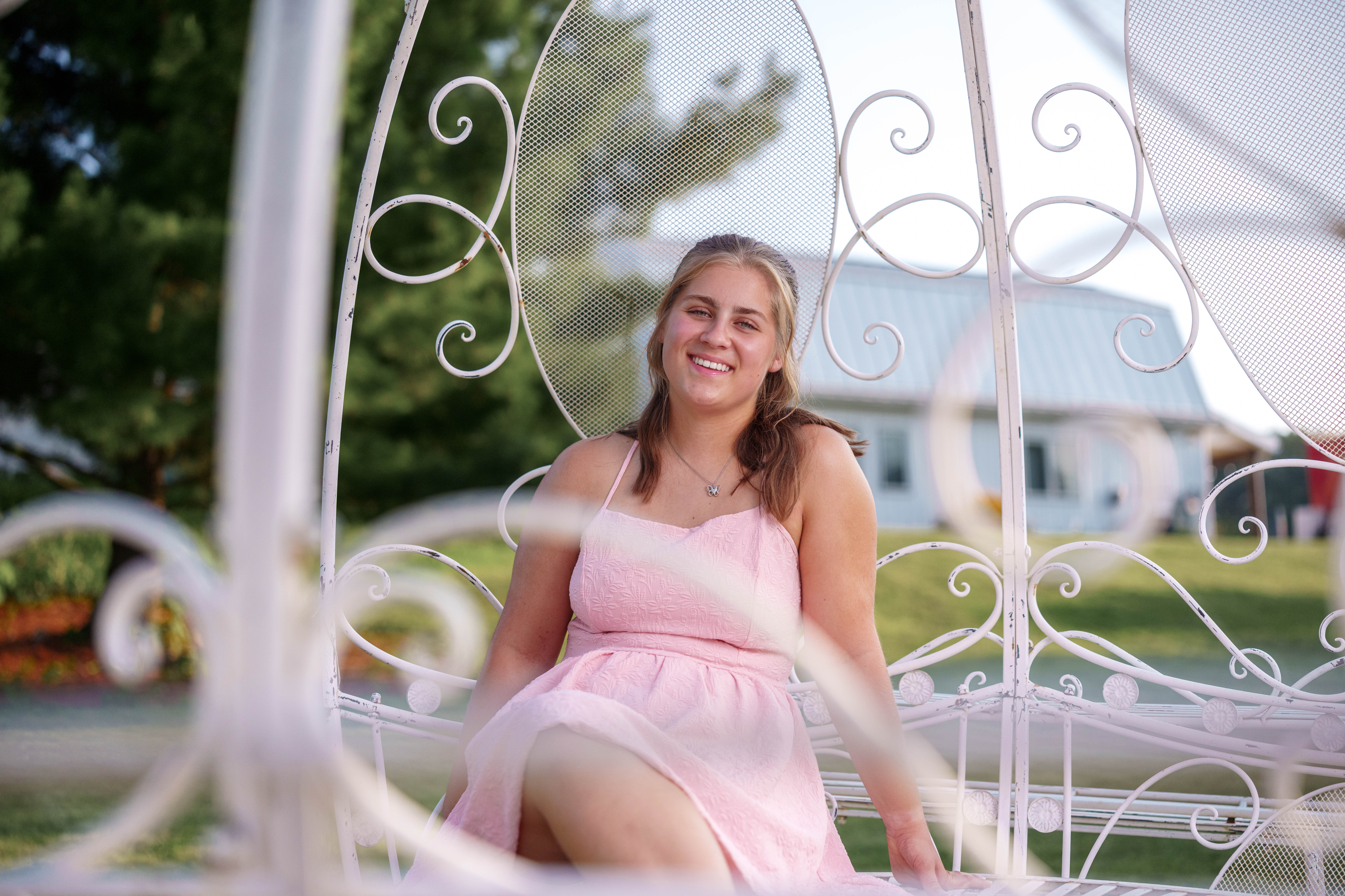 Shannon Weber poses for senior photos at Parrfection Produce Farm Market outside Monticello Wisconsin on August 7th, 2025. Weber will graduate in 2026. Photography by Ross Harried for Second Crop Creative.