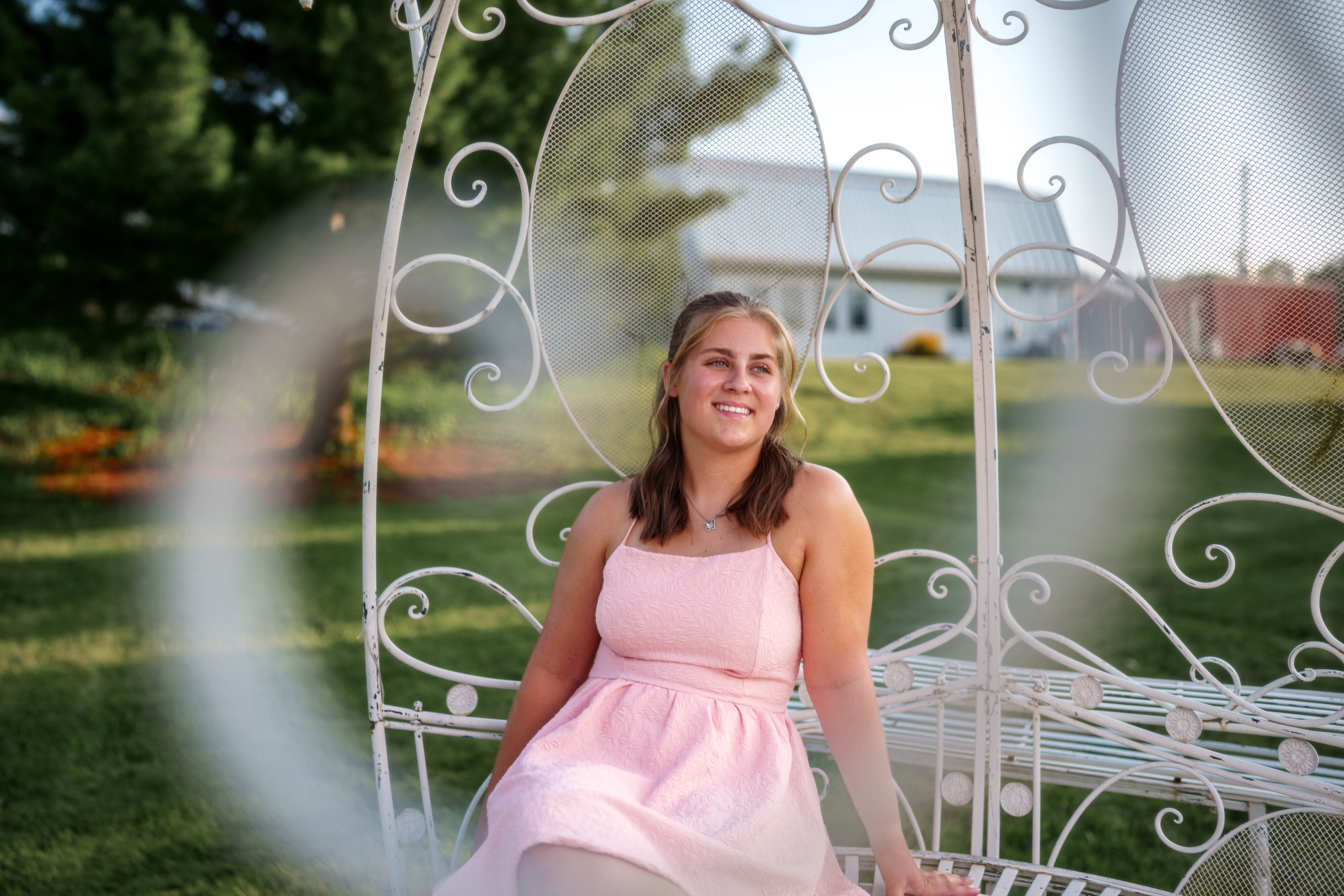 Shannon Weber poses for senior photos at Parrfection Produce Farm Market outside Monticello Wisconsin on August 7th, 2025. Weber will graduate in 2026. Photography by Ross Harried for Second Crop Creative.
