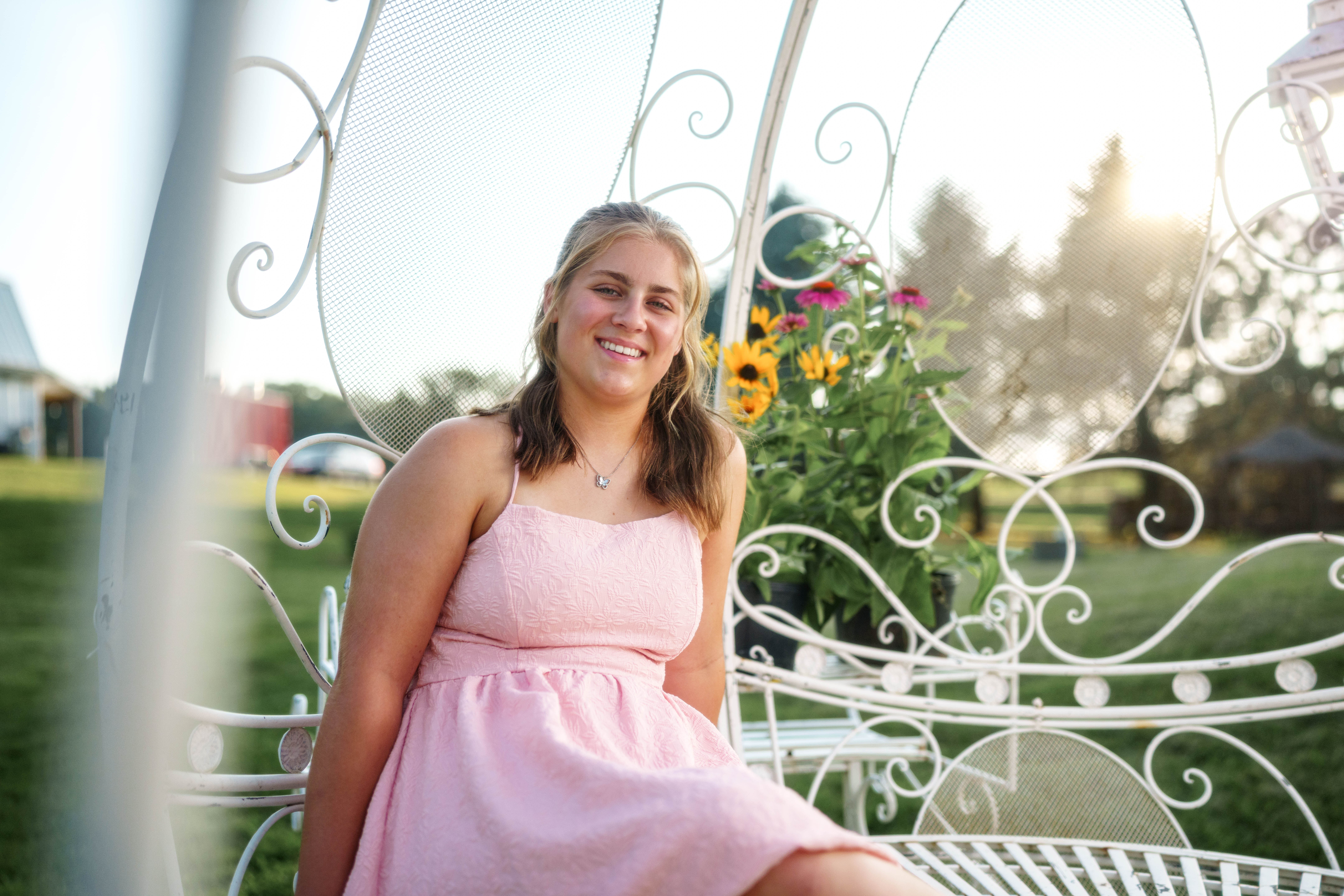 Shannon Weber poses for senior photos at Parrfection Produce Farm Market outside Monticello Wisconsin on August 7th, 2025. Weber will graduate in 2026. Photography by Ross Harried for Second Crop Creative.