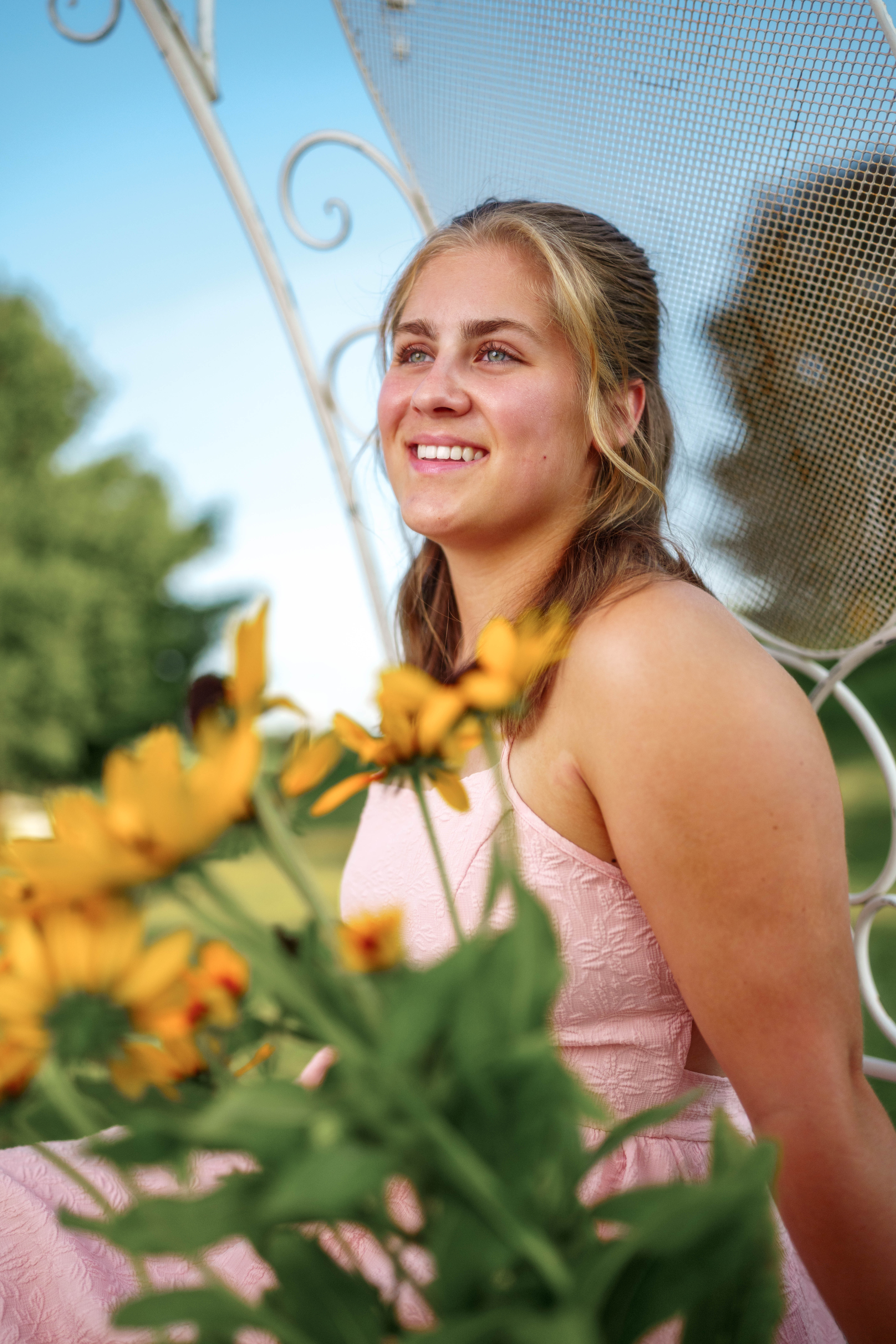 Shannon Weber poses for senior photos at Parrfection Produce Farm Market outside Monticello Wisconsin on August 7th, 2025. Weber will graduate in 2026. Photography by Ross Harried for Second Crop Creative.