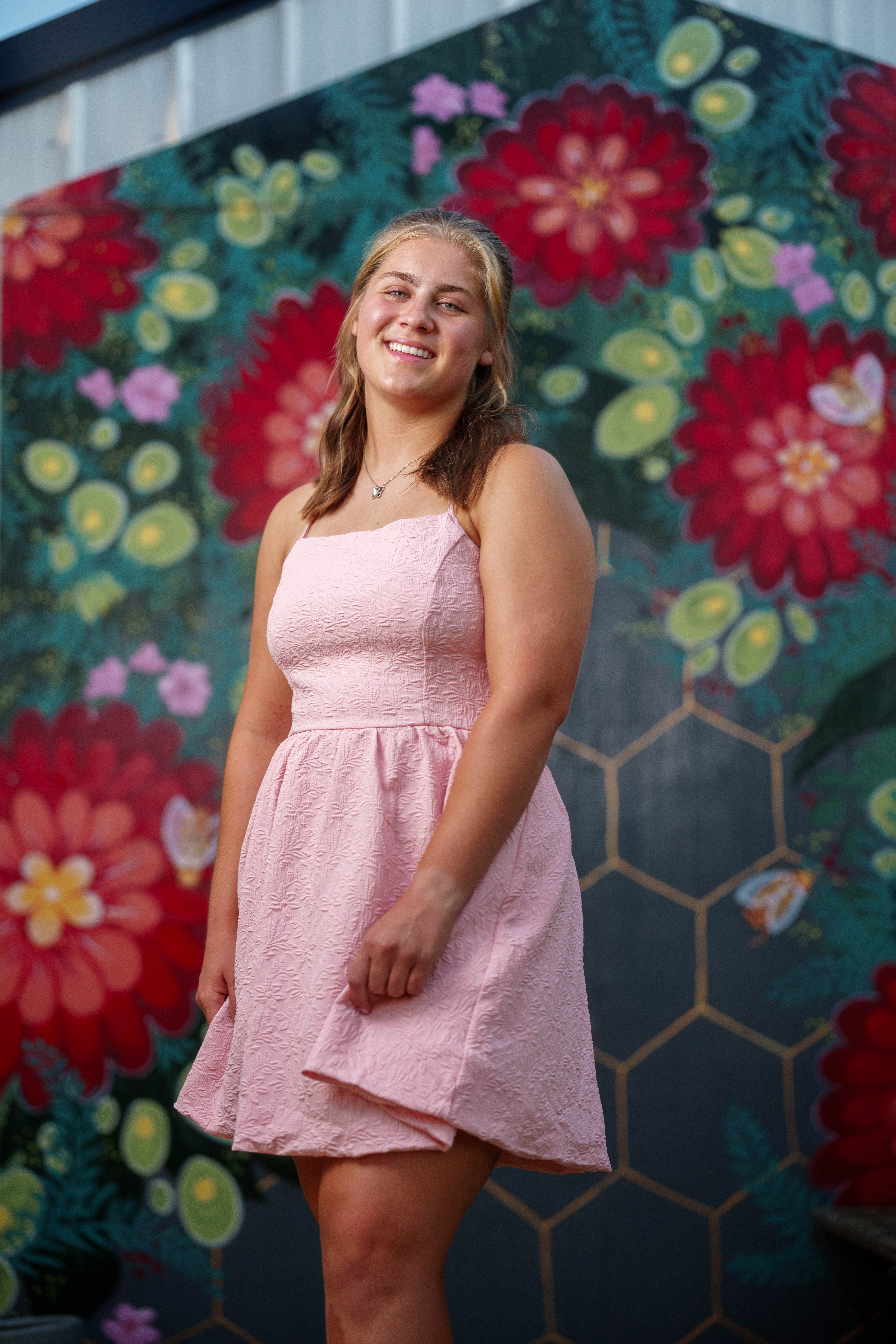 Shannon Weber poses for senior photos at Parrfection Produce Farm Market outside Monticello Wisconsin on August 7th, 2025. Weber will graduate in 2026. Photography by Ross Harried for Second Crop Creative.