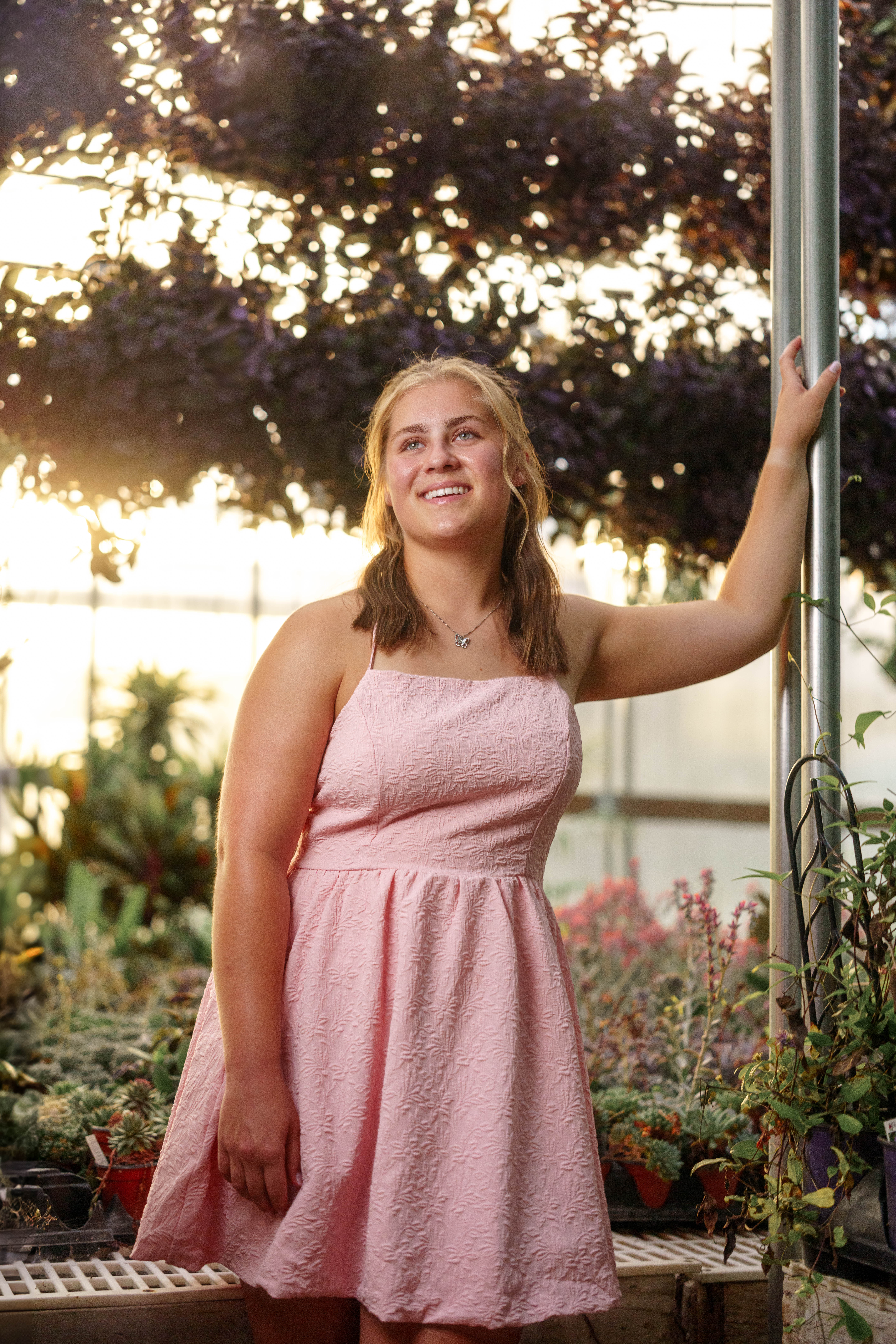 Shannon Weber poses for senior photos at Parrfection Produce Farm Market outside Monticello Wisconsin on August 7th, 2025. Weber will graduate in 2026. Photography by Ross Harried for Second Crop Creative.