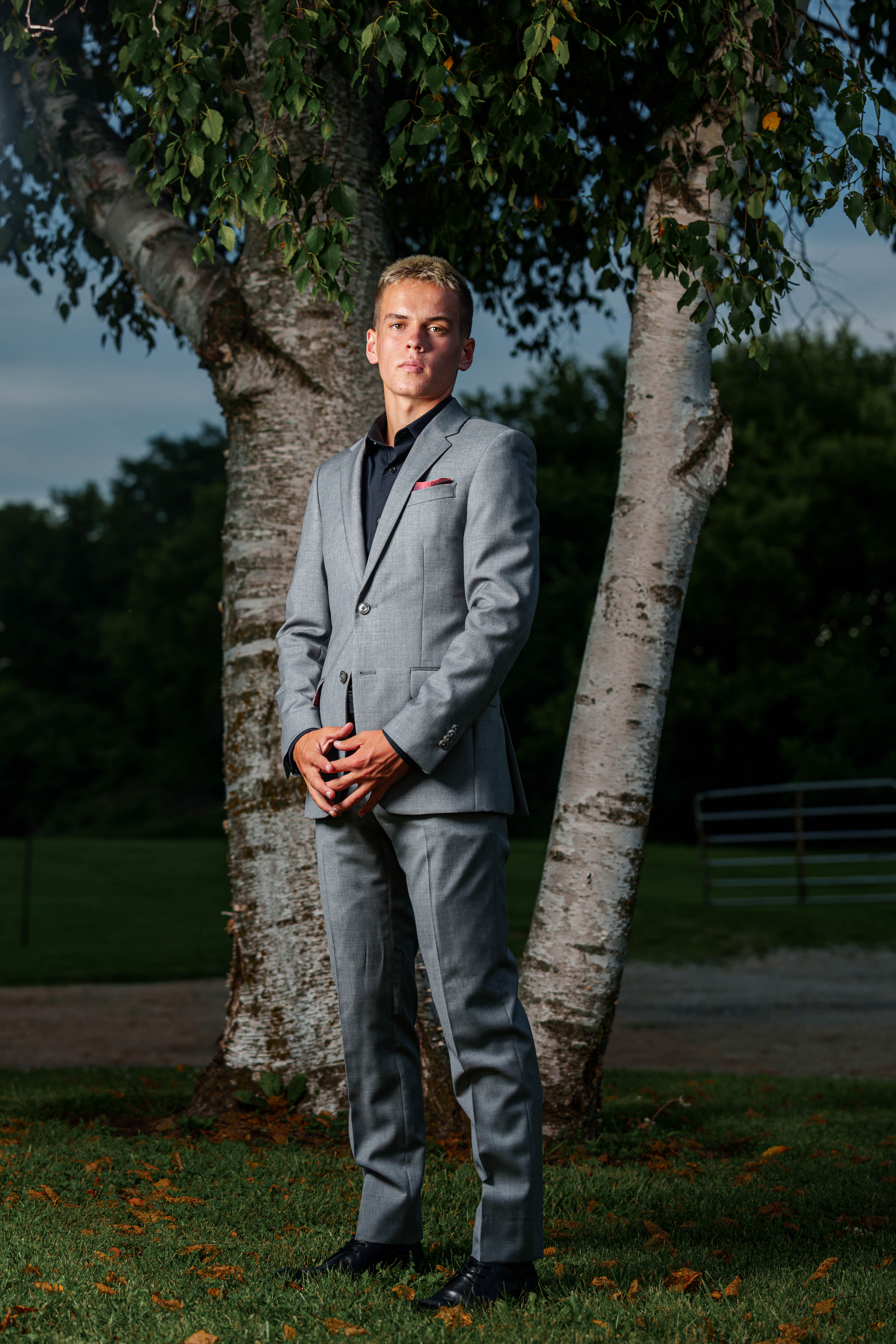 Tre Dammen poses for senior photos in Monroe Wisconsin on August 11th, 2025. Dammen will graduate in 2026. Photography by Ross Harried for Second Crop Creative.