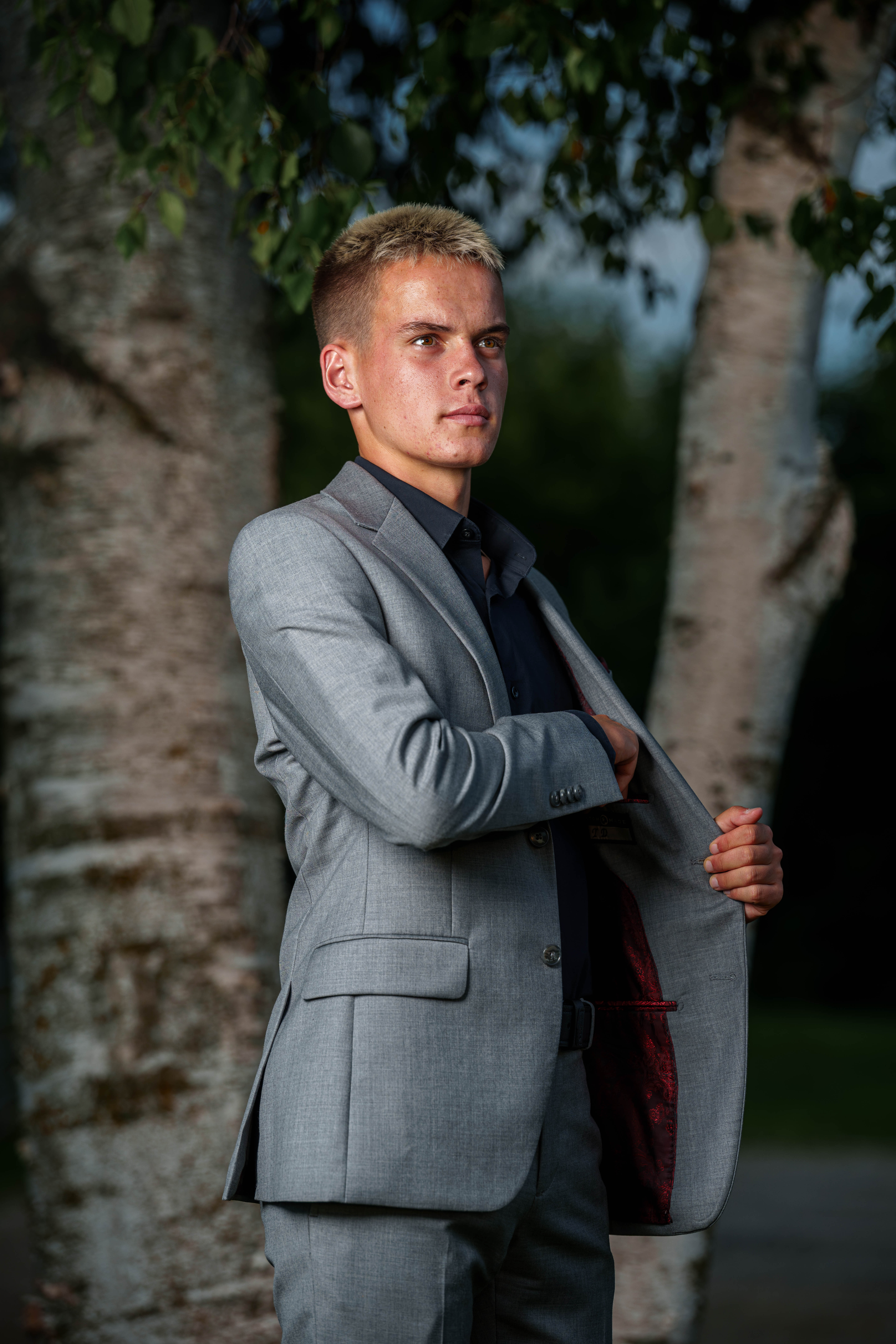 Tre Dammen poses for senior photos in Monroe Wisconsin on August 11th, 2025. Dammen will graduate in 2026. Photography by Ross Harried for Second Crop Creative.