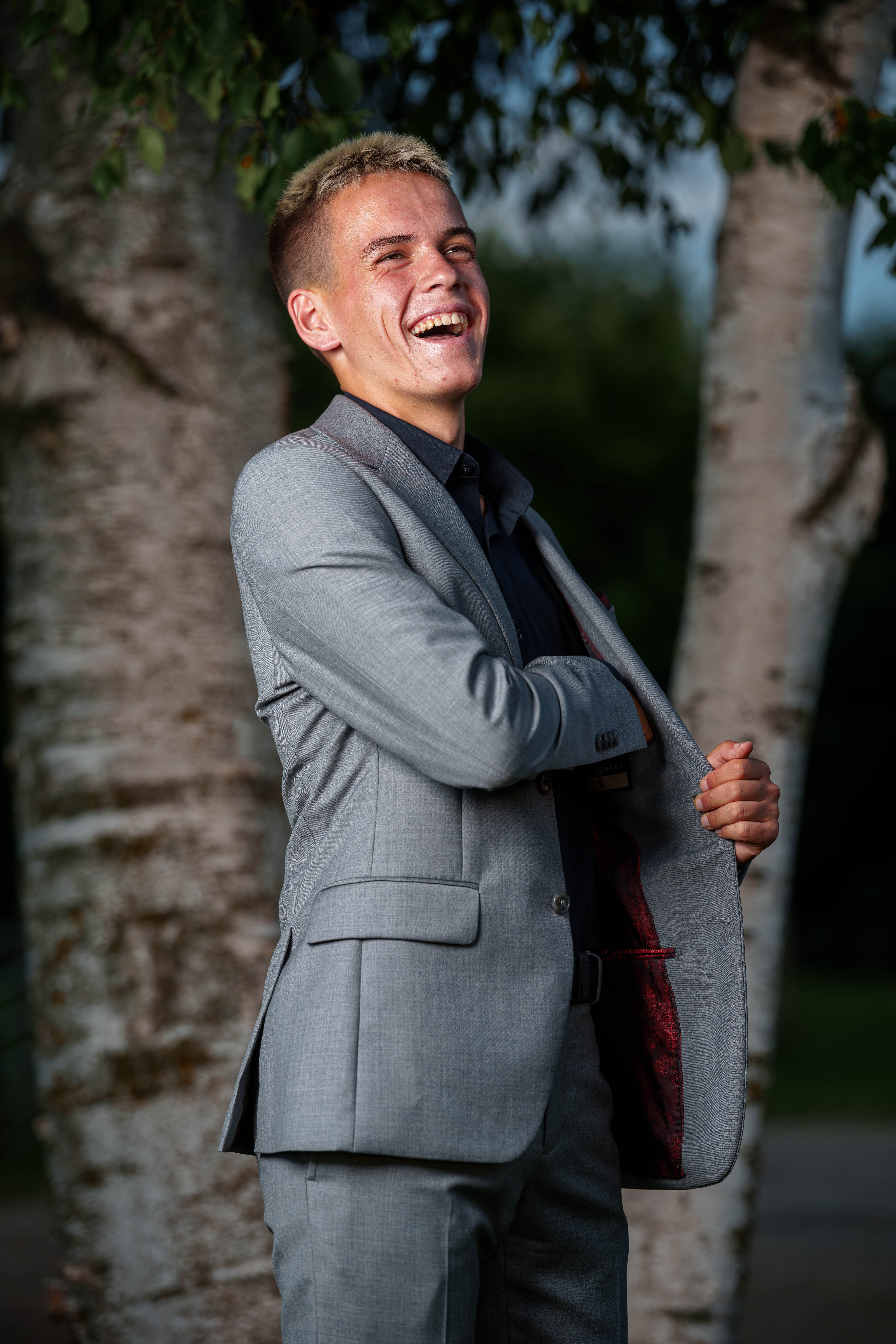 Tre Dammen poses for senior photos in Monroe Wisconsin on August 11th, 2025. Dammen will graduate in 2026. Photography by Ross Harried for Second Crop Creative.
