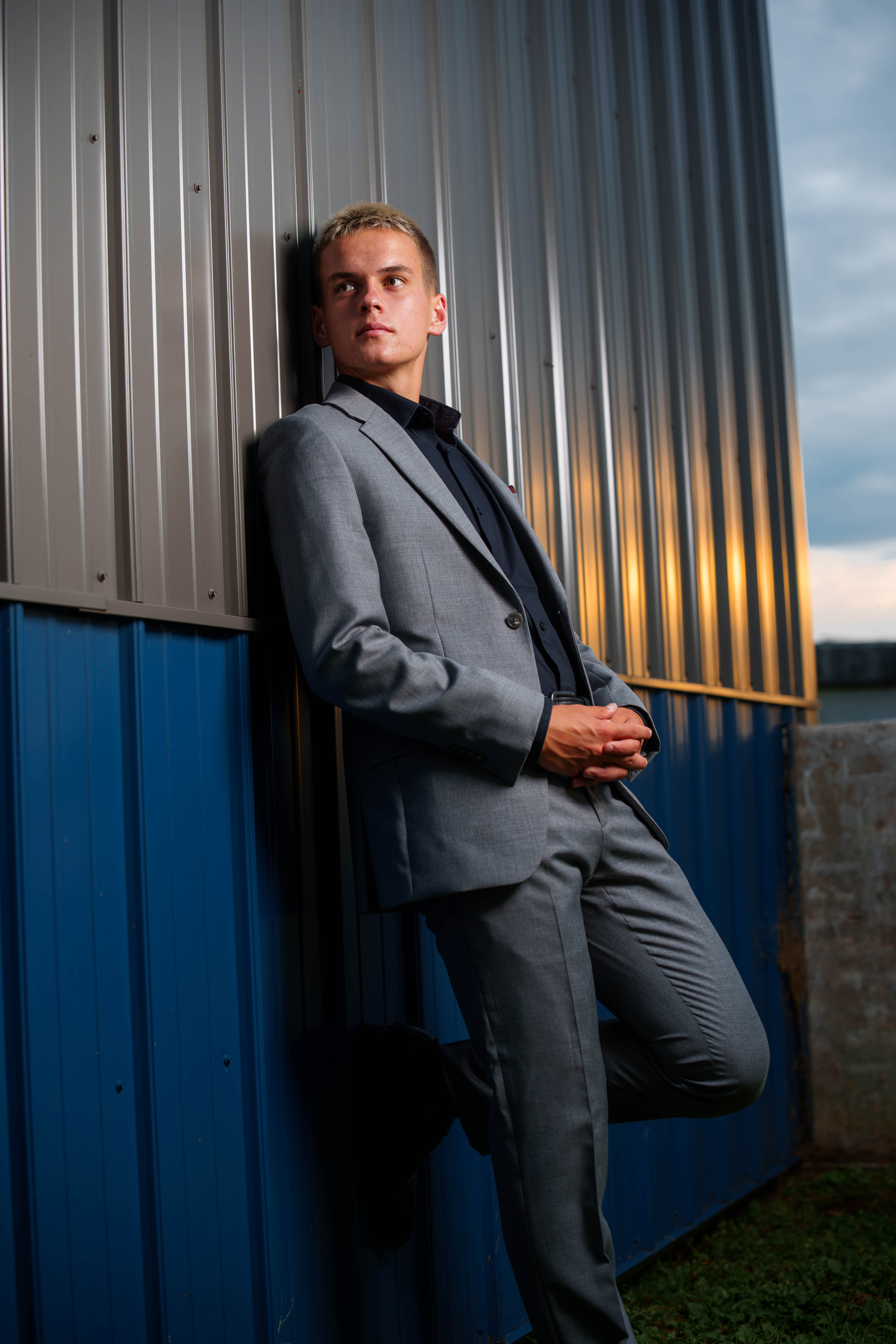 Tre Dammen poses for senior photos in Monroe Wisconsin on August 11th, 2025. Dammen will graduate in 2026. Photography by Ross Harried for Second Crop Creative.