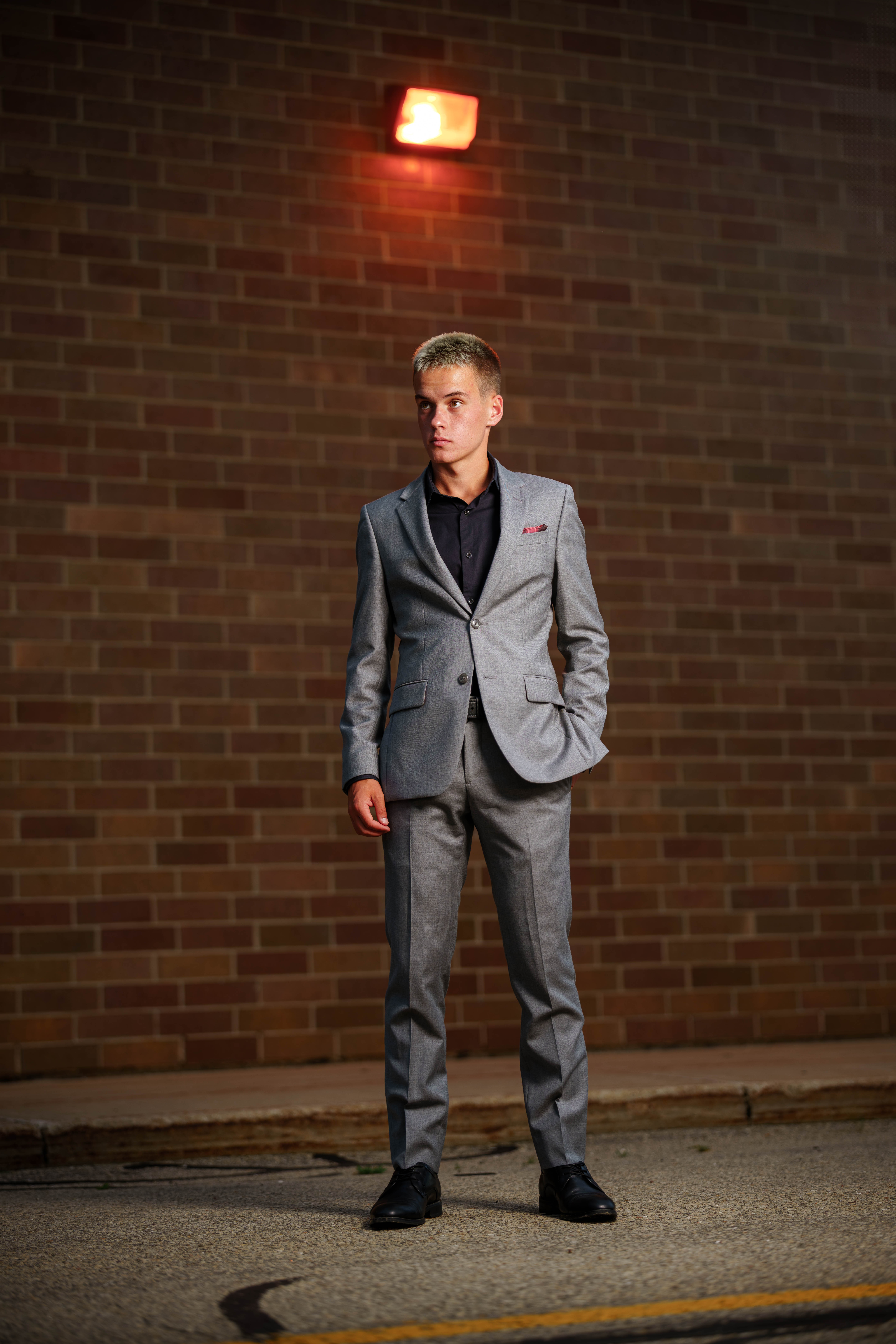 Tre Dammen poses for senior photos in Monroe Wisconsin on August 11th, 2025. Dammen will graduate in 2026. Photography by Ross Harried for Second Crop Creative.