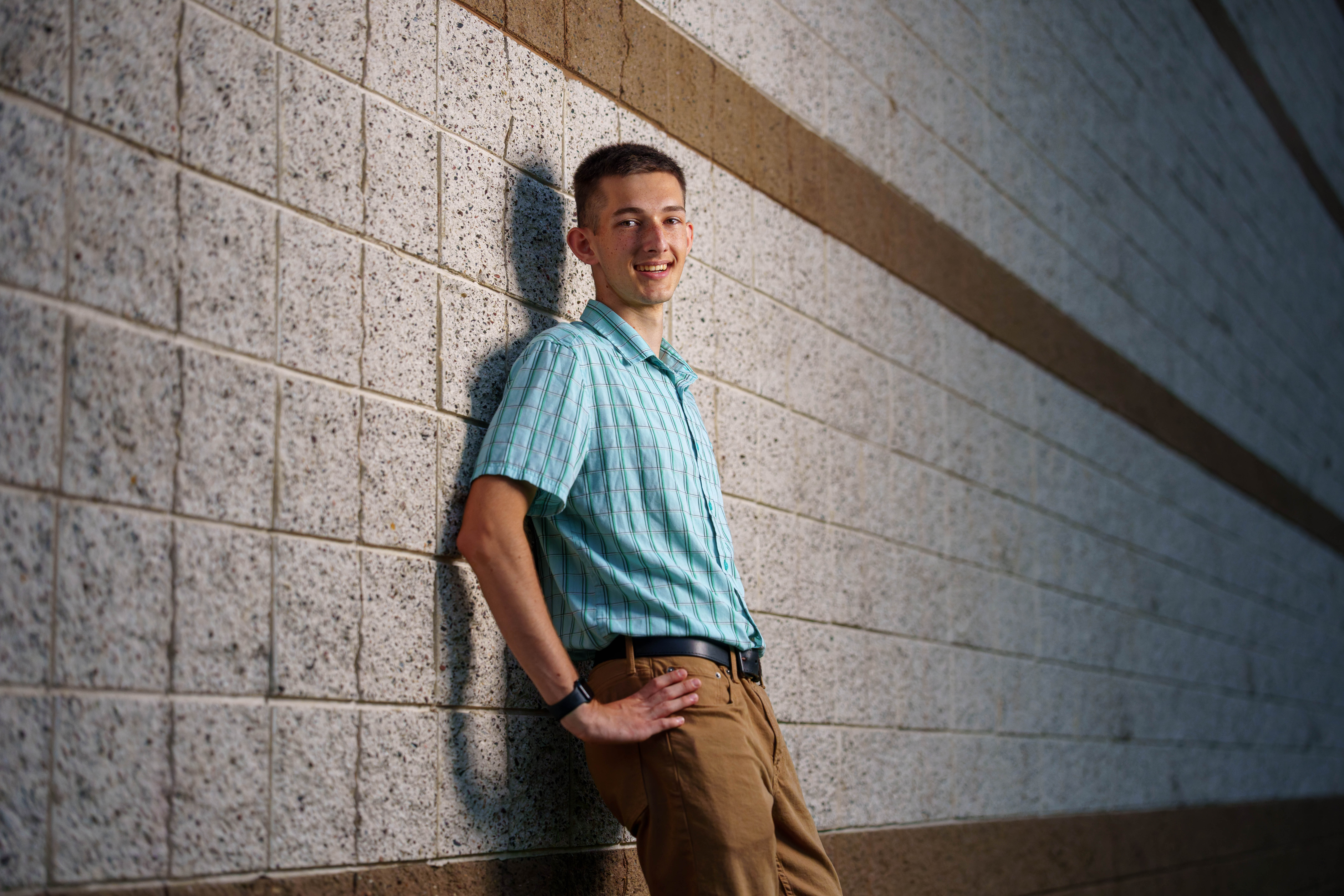 James Mayer poses for senior photos in Monroe Wisconsin on August 12th, 2025. Mayer will graduate in 2026. Photography by Ross Harried for Second Crop Creative.