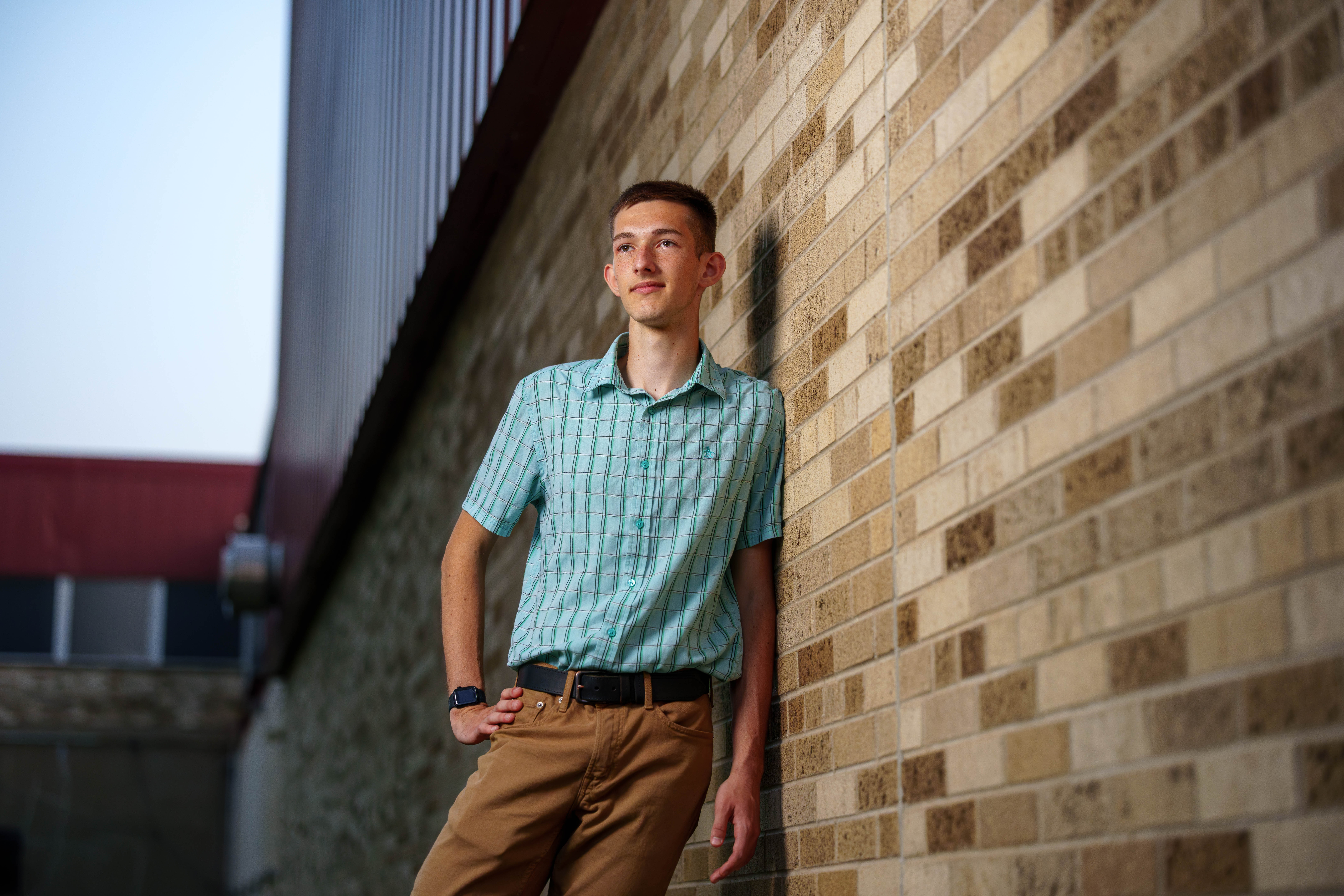 James Mayer poses for senior photos in Monroe Wisconsin on August 12th, 2025. Mayer will graduate in 2026. Photography by Ross Harried for Second Crop Creative.