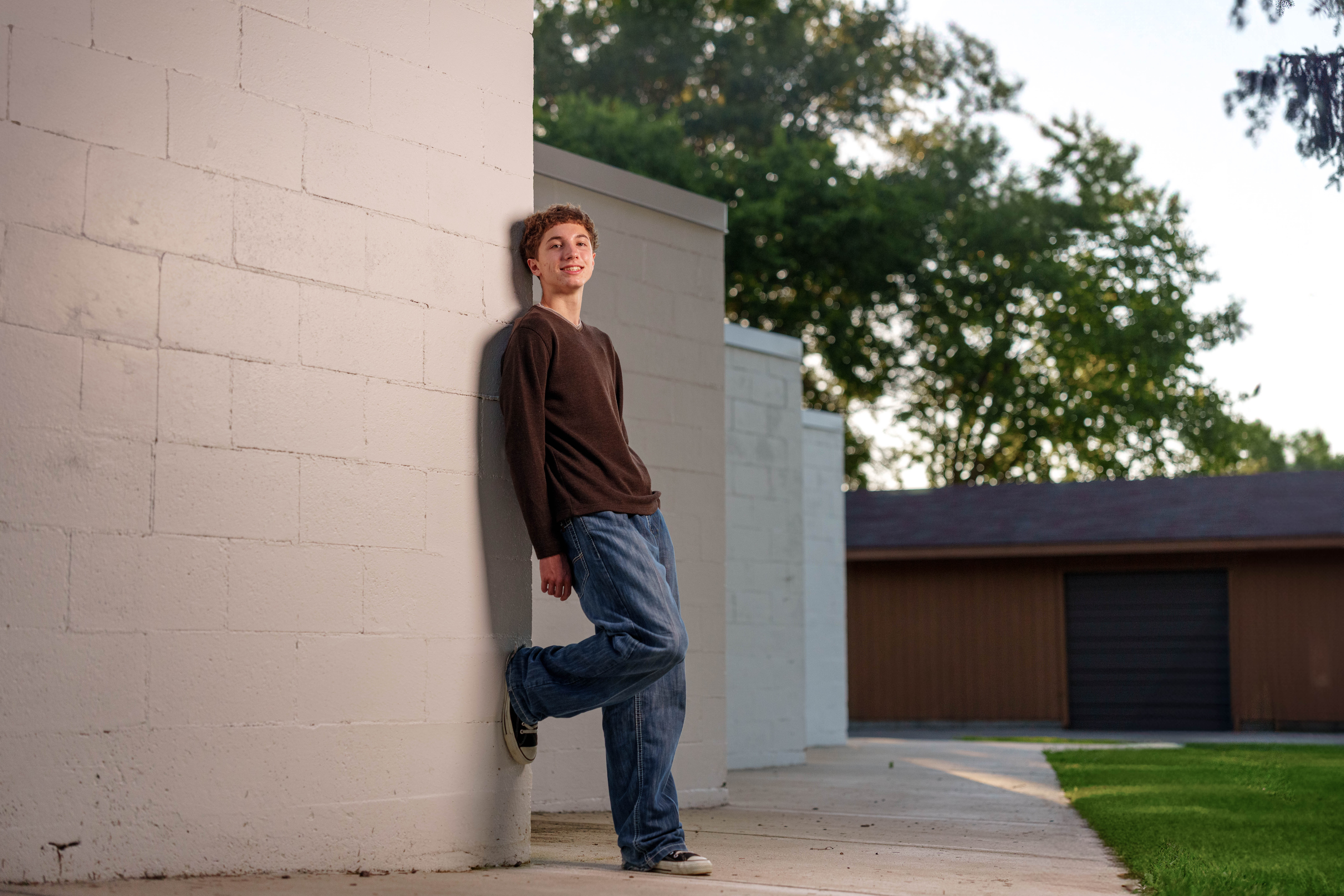 Click to View Larger Ethan Williams poses for senior photos in Monroe, Wisconsin on August 19th, 2025. Williams will graduate in 2026. Photography by Ross Harried for Second Crop Creative.