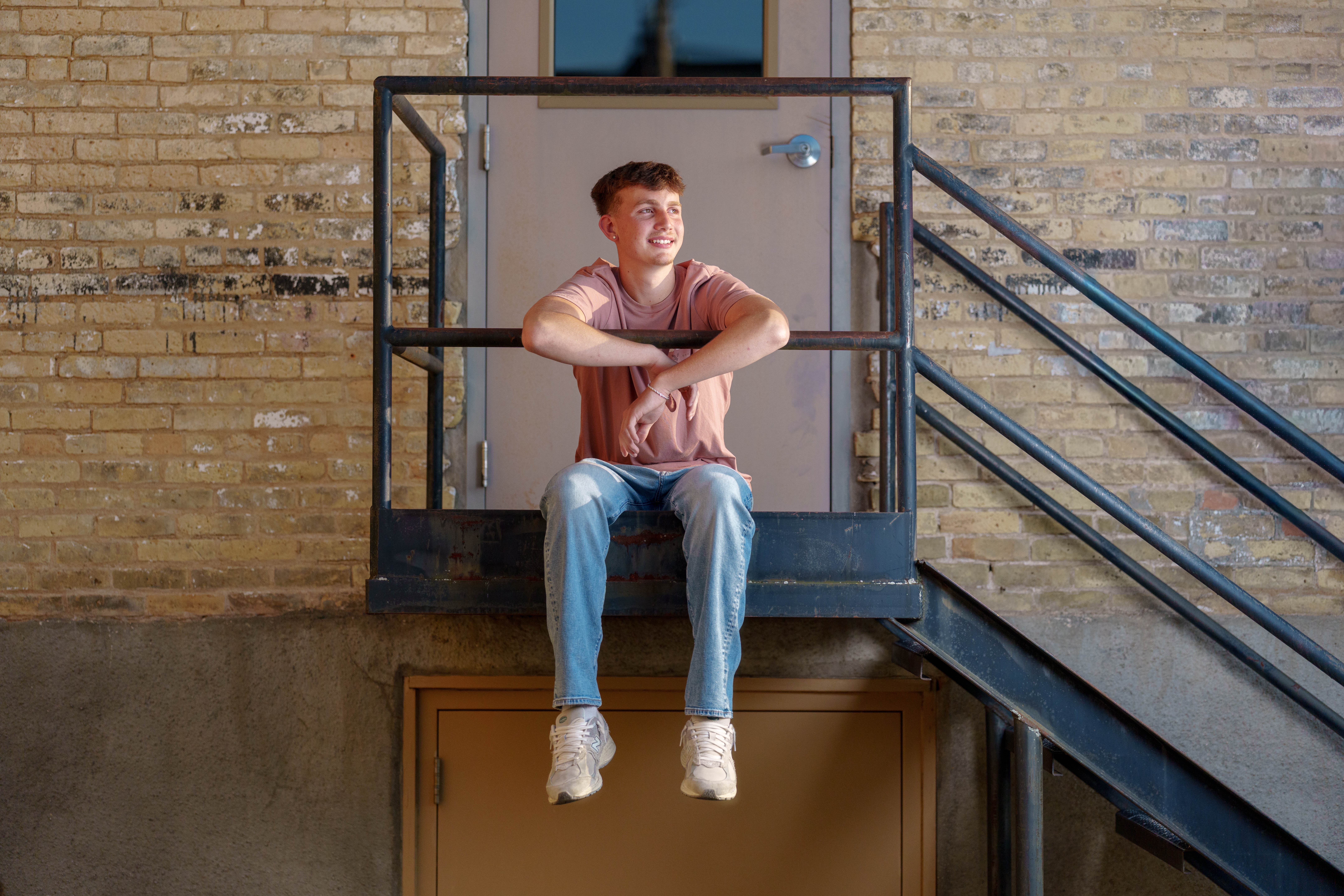 Click to View Larger Logan Taylor poses for senior photos in Monroe, Wisconsin on September 8th, 2025. Taylor will graduate in 2026. Photography by Ross Harried for Second Crop Creative.