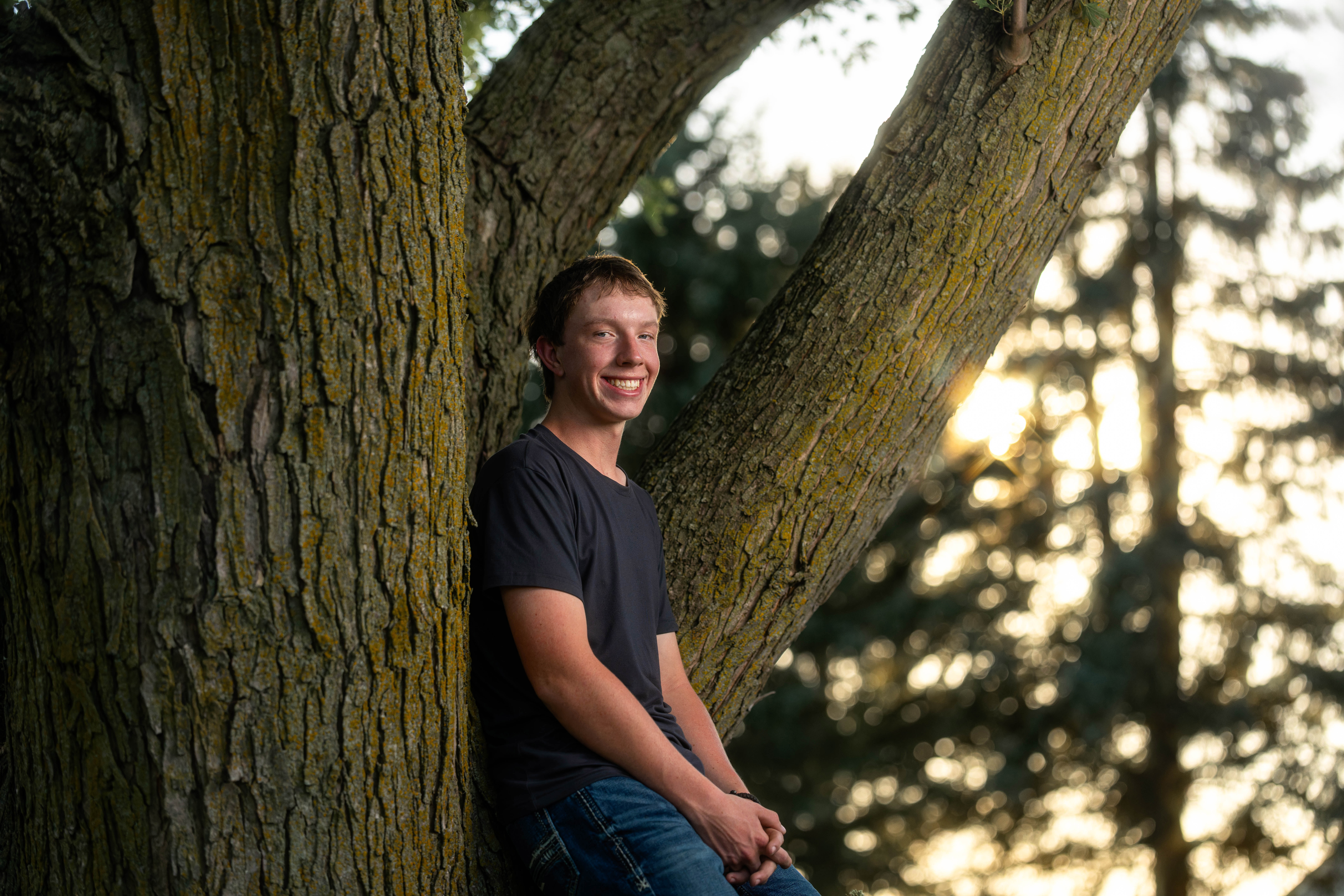 Coldan Altmann poses for senior photos in Monroe, Wisconsin on September 29th, 2025. Altmann will graduate in 2026. Photography by Ross Harried for Second Crop Creative.