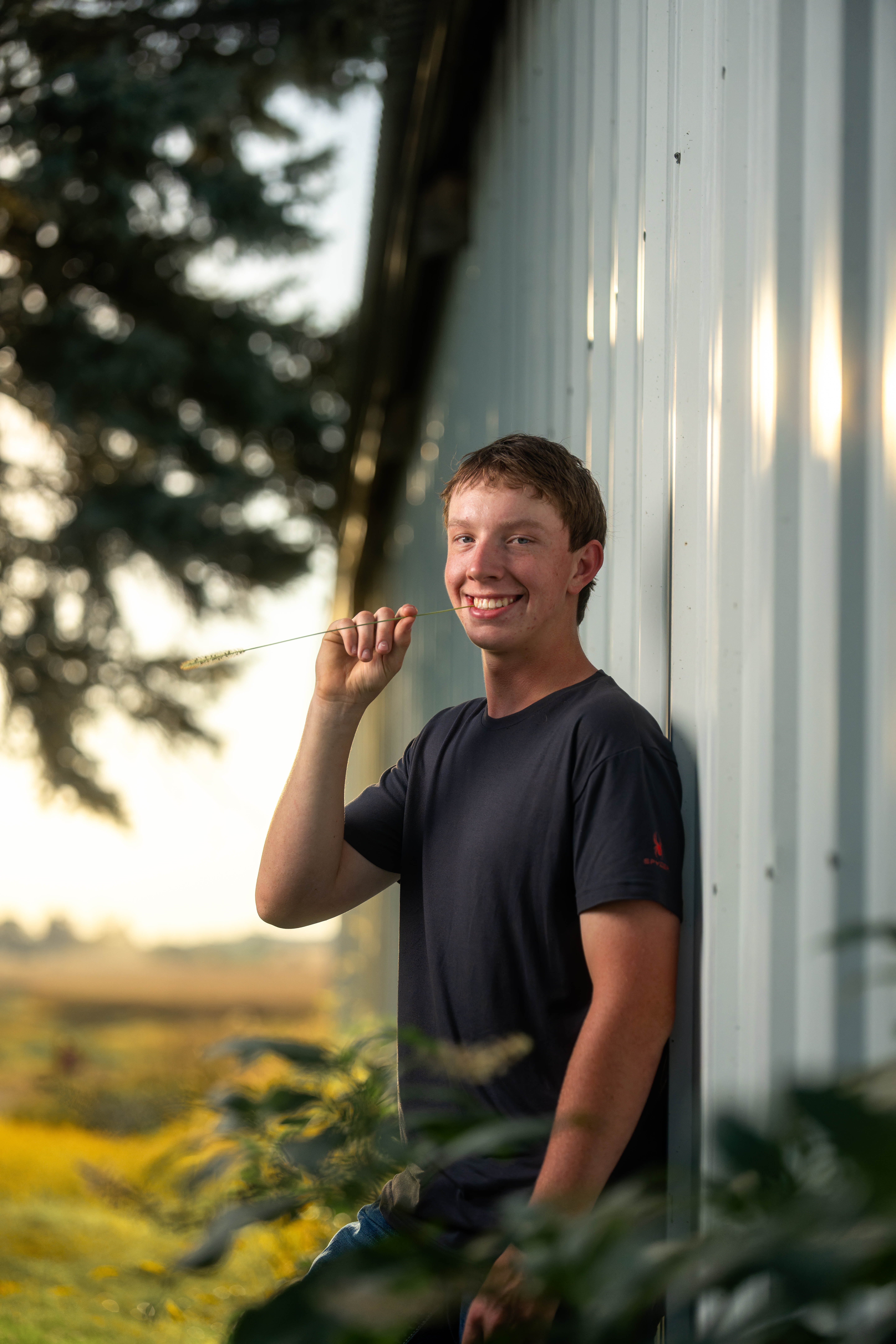 Coldan Altmann poses for senior photos in Monroe, Wisconsin on September 29th, 2025. Altmann will graduate in 2026. Photography by Ross Harried for Second Crop Creative.