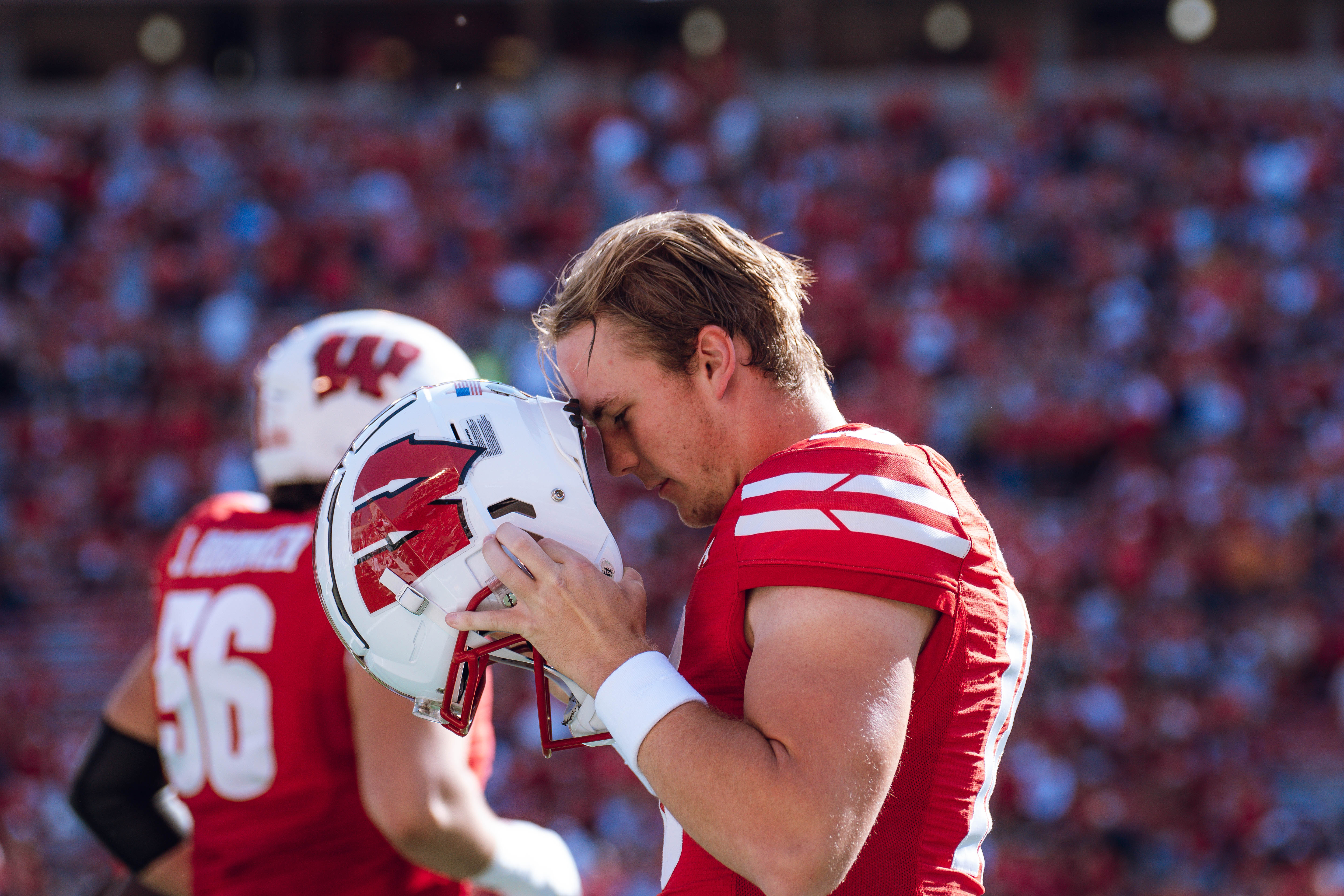 Wisconsin Badgers quarterback Mabrey Mettauer #11 gets ready against the Purdue Boilermakers at Camp Randall Stadium on October 5, 2024 in Madison, Wisconsin. Photography by Ross Harried for Second Crop Sports.