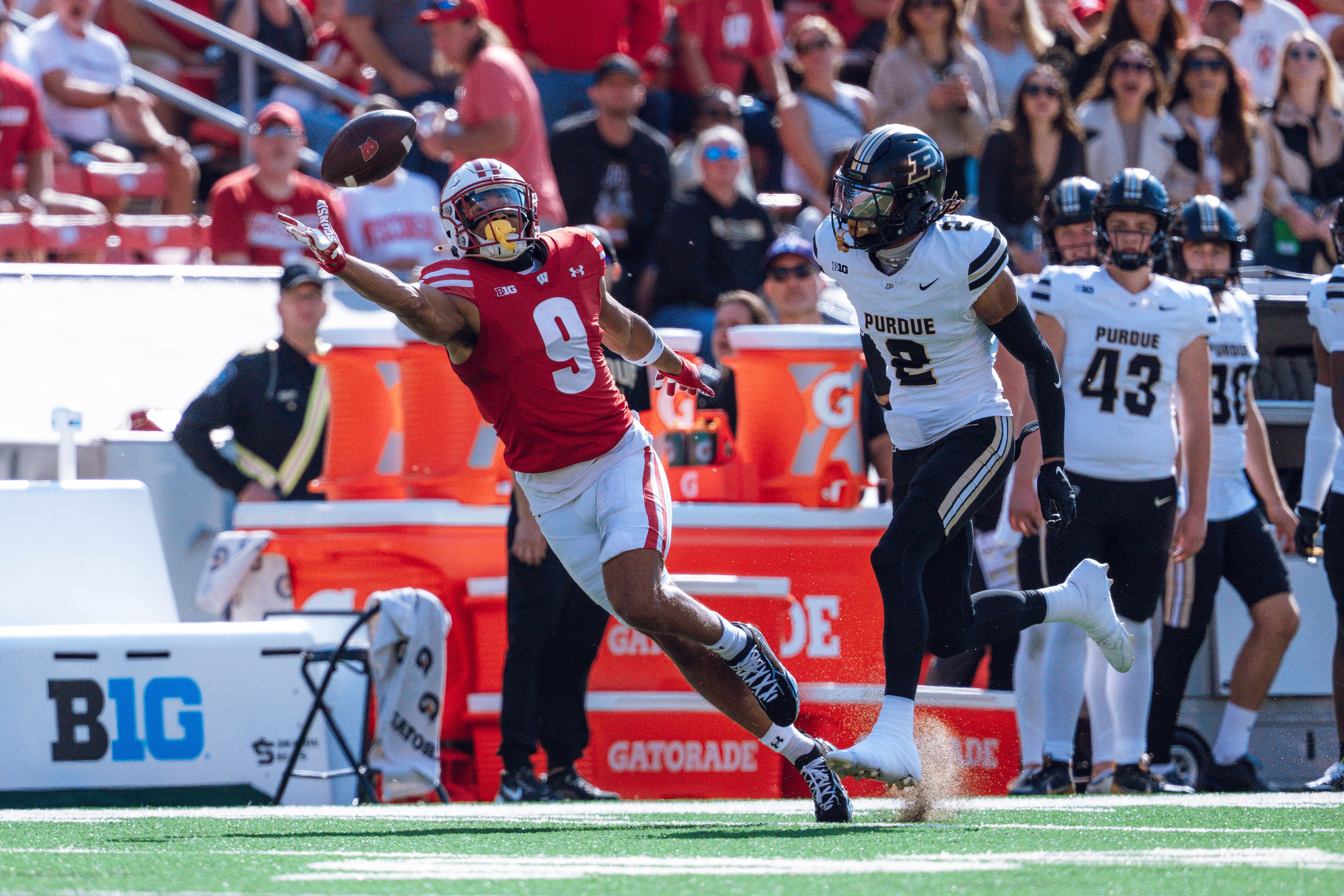 Wisconsin Badgers wide receiver Bryson Green #9 attempts to haul in a pass just out of his reach against the Purdue Boilermakers at Camp Randall Stadium on October 5, 2024 in Madison, Wisconsin. Photography by Ross Harried for Second Crop Sports.