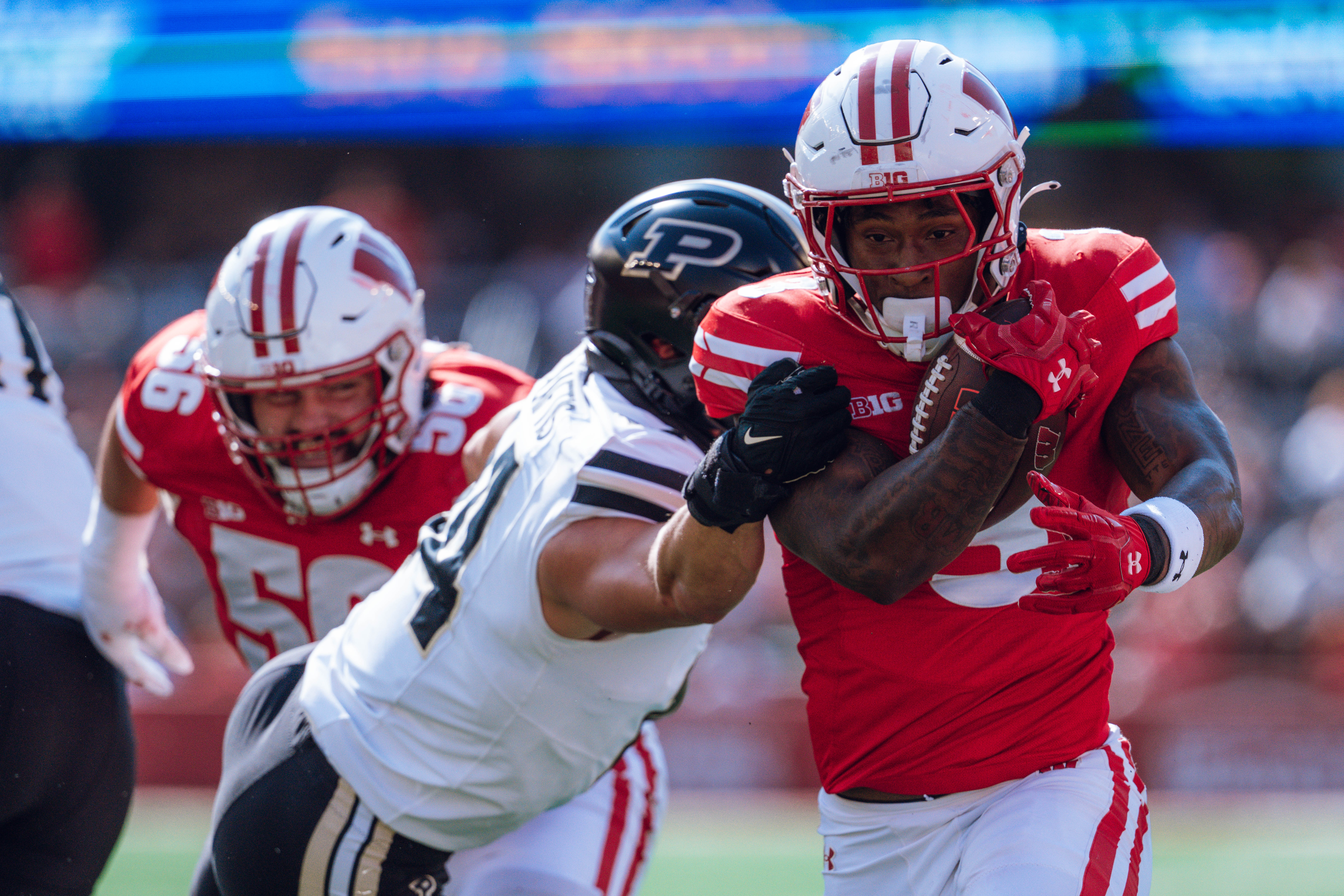 Wisconsin Badgers running back Tawee Walker #3 runs in a touchdown against the Purdue Boilermakers at Camp Randall Stadium on October 5, 2024 in Madison, Wisconsin. Photography by Ross Harried for Second Crop Sports.