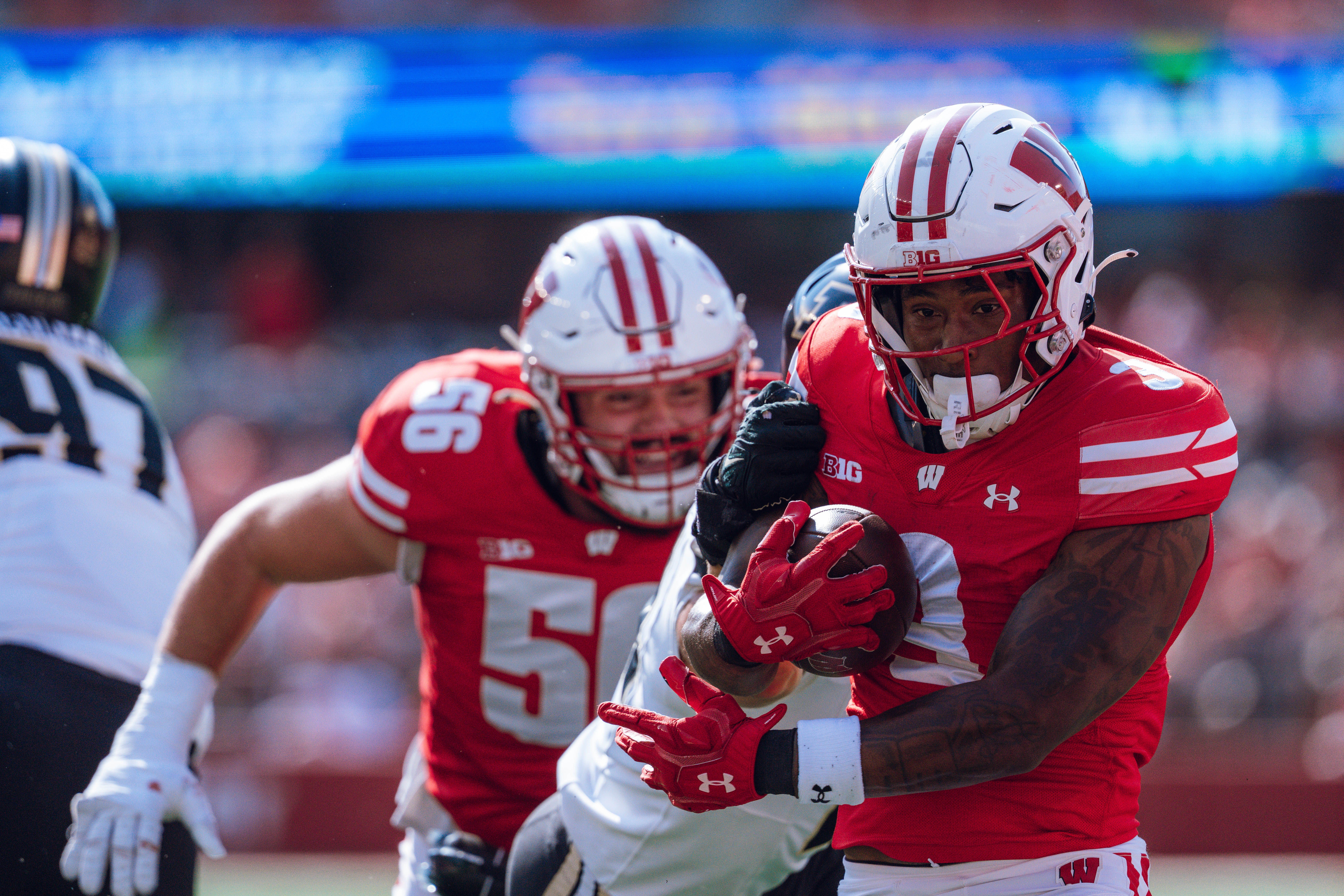 Wisconsin Badgers running back Tawee Walker #3 runs in a touchdown against the Purdue Boilermakers at Camp Randall Stadium on October 5, 2024 in Madison, Wisconsin. Photography by Ross Harried for Second Crop Sports.